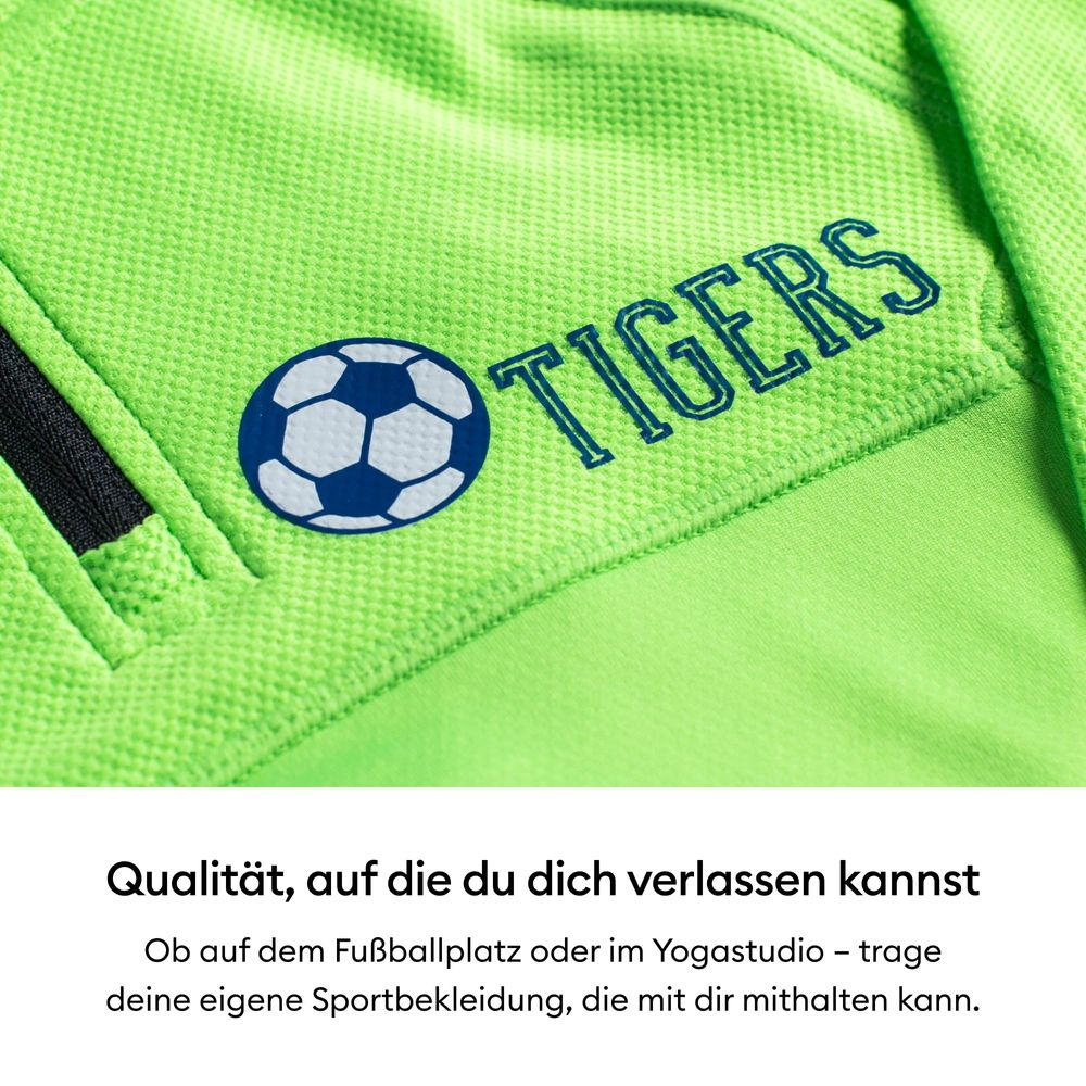 Maglia verde con pallone da calcio blu e scritta TIGERS.