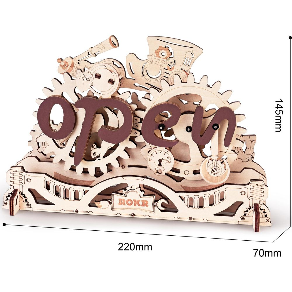 Holzmodell mit Zahnrädern und der Aufschrift 'Open'. Maße 220x145x70mm.