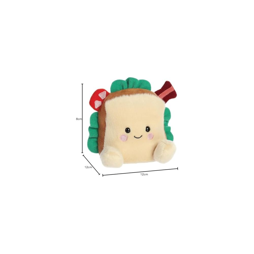 Un peluche a forma di panino con faccina carina, lattuga, bacon e pomodoro.