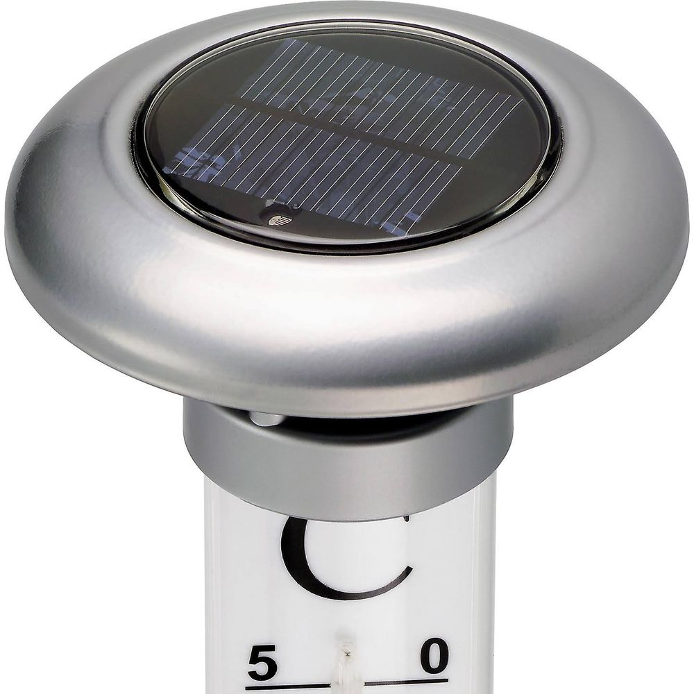 Silberne Solar-Schwimmbadthermometer mit sichtbarem Solarpanel und Skala.