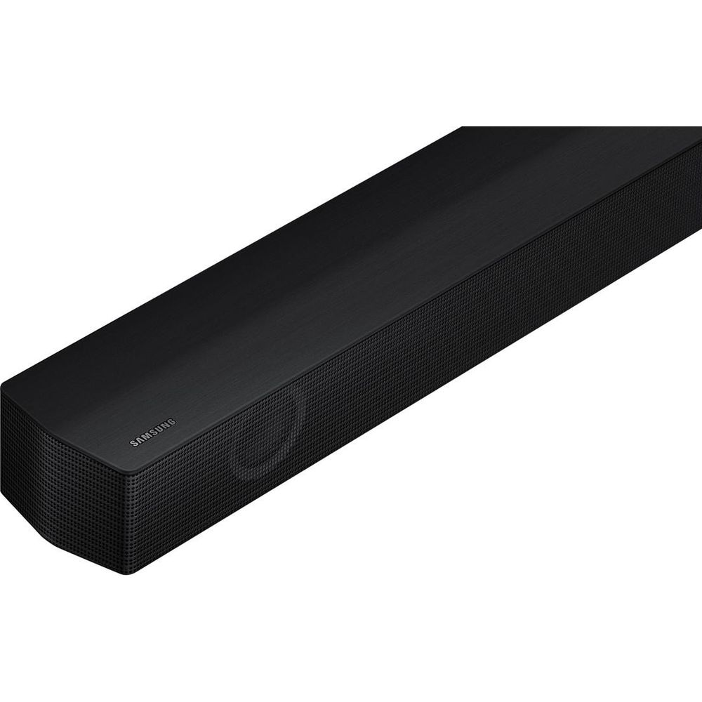 Barre de son Samsung noire avec grilles de haut-parleurs visibles et logo Samsung discret.
