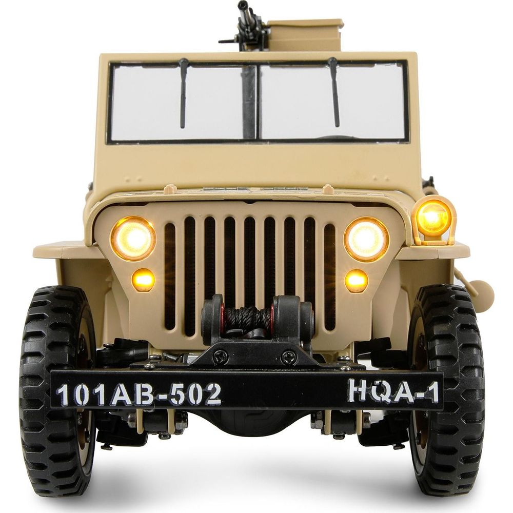 Ein beigefarbener Jeep mit Gewehr, Scheinwerfern und Winde. Weiße Lichter leuchten.