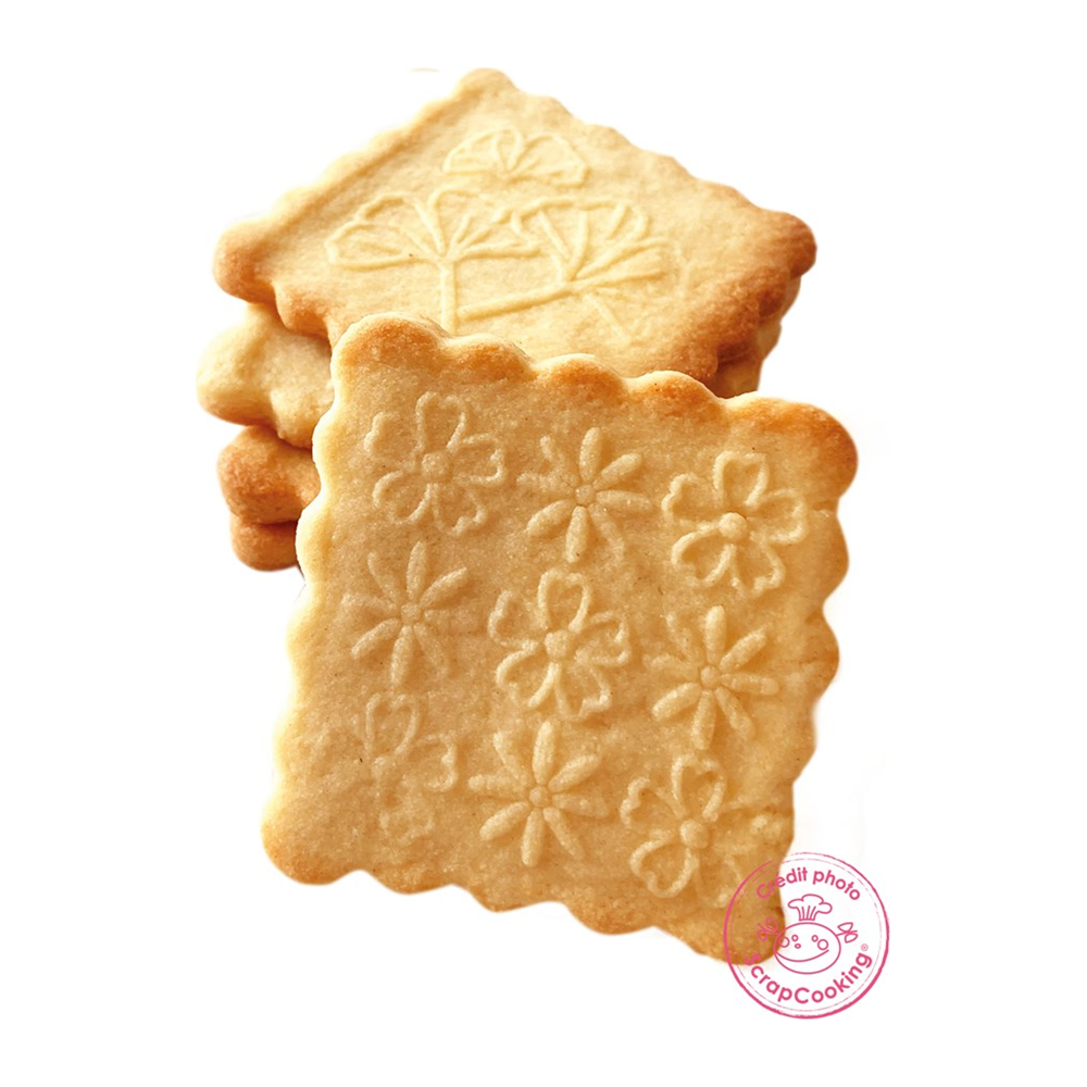 Ein Stapel Kekse mit Blumenmuster und einem Keks mit Blattmuster.
