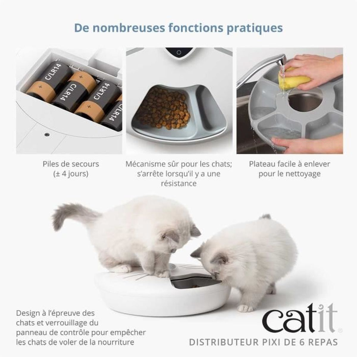 Due soffici gattini mangiano da un distributore automatico bianco. In alto si vedono batterie, cibo e vassoio.