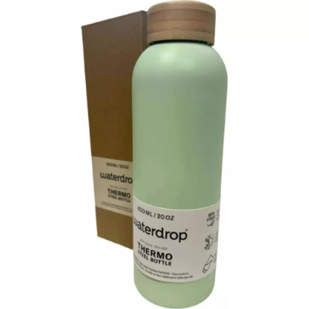 Eine hellgrüne Thermoflasche mit Holzdeckel neben ihrer braunen Verpackung.
