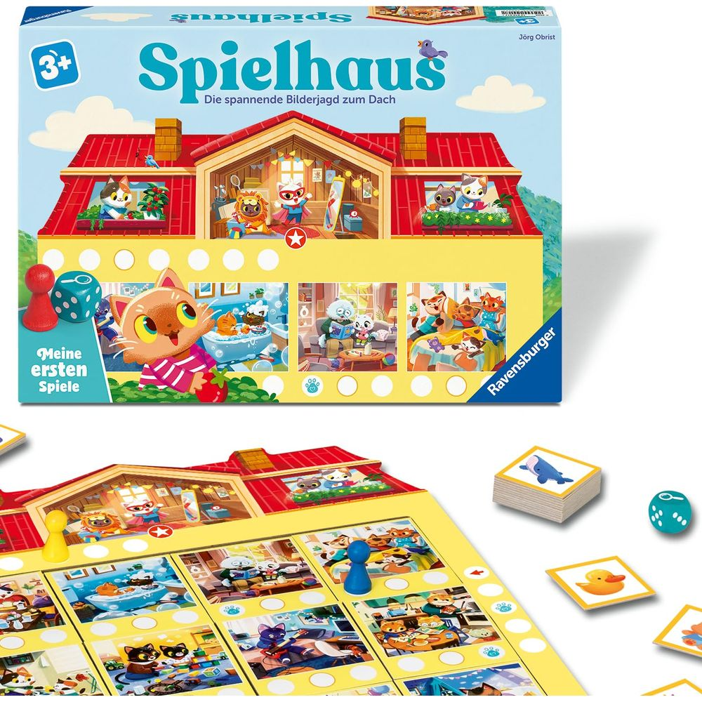 Brettspiel mit Katzenfiguren: Haus, Spielfeld, Würfel, Karten.