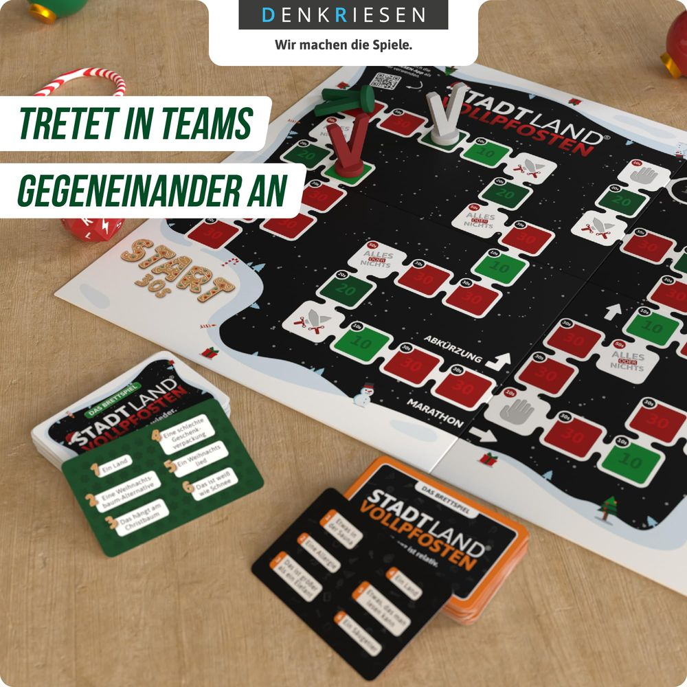 Brettspiel "Stadt Land Vollpfosten" mit Karten und Spielfeld. Text auf Deutsch.