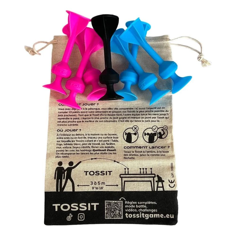Pezzi del gioco da lancio blu e rosa su una borsa. Regole del gioco stampate sulla borsa.