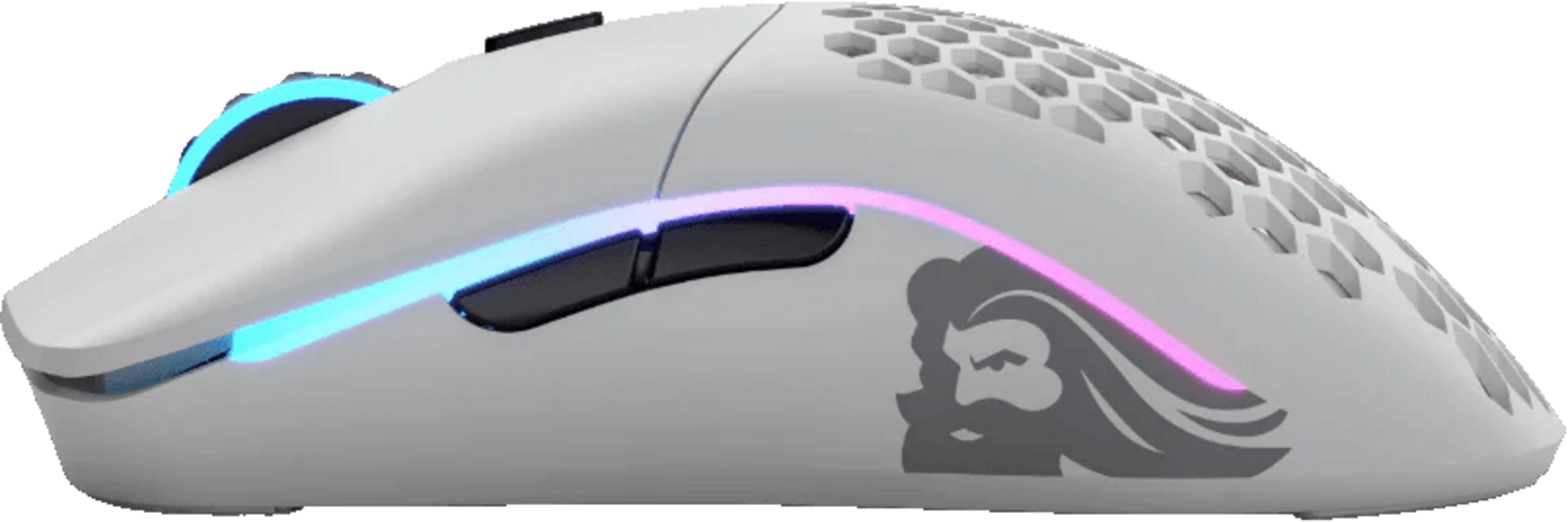 Un mouse da gaming bianco con motivo a nido d'ape e illuminazione RGB.