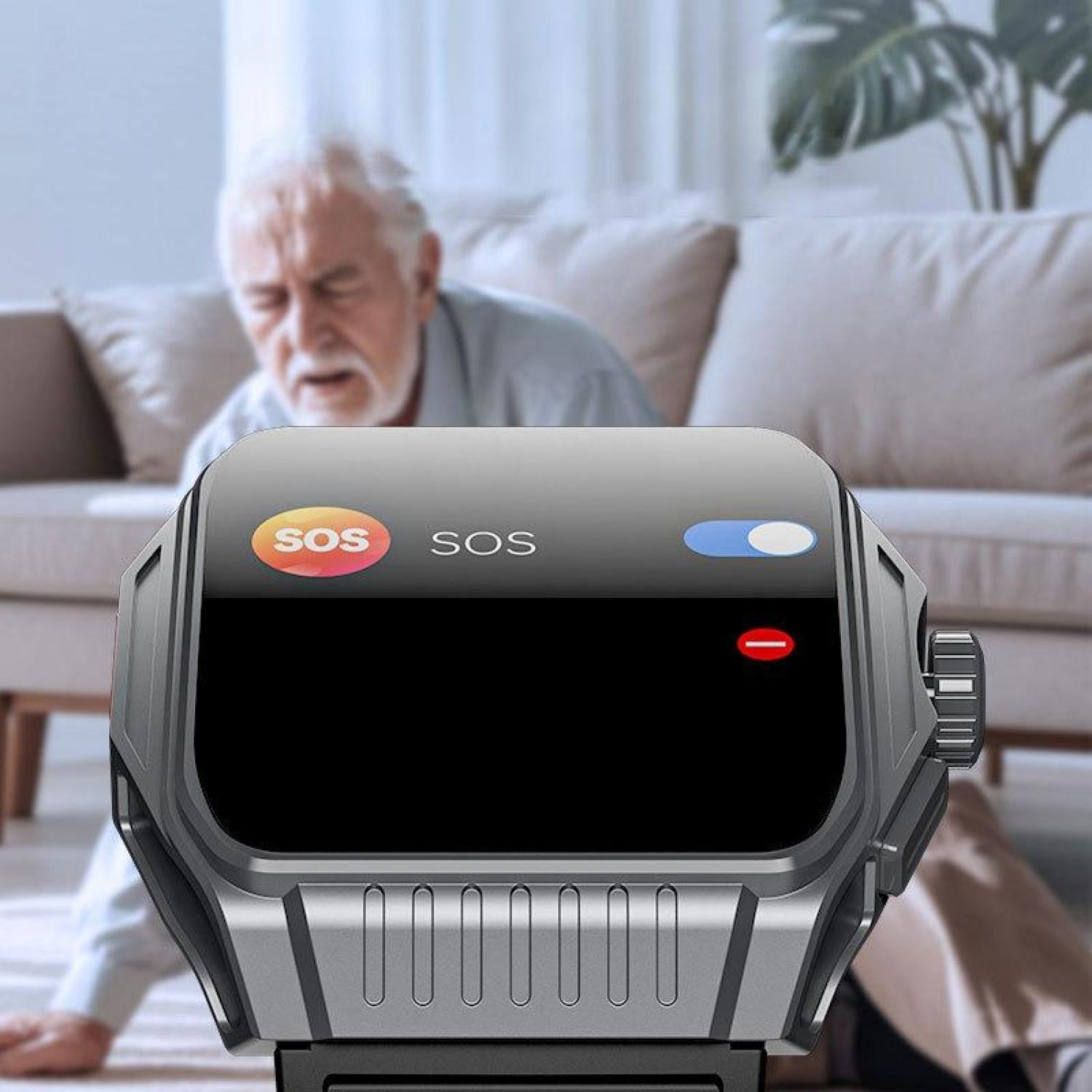 Ein älterer Mann liegt auf dem Boden, während eine Smartwatch mit SOS-Anzeige im Vordergrund zu sehen ist.