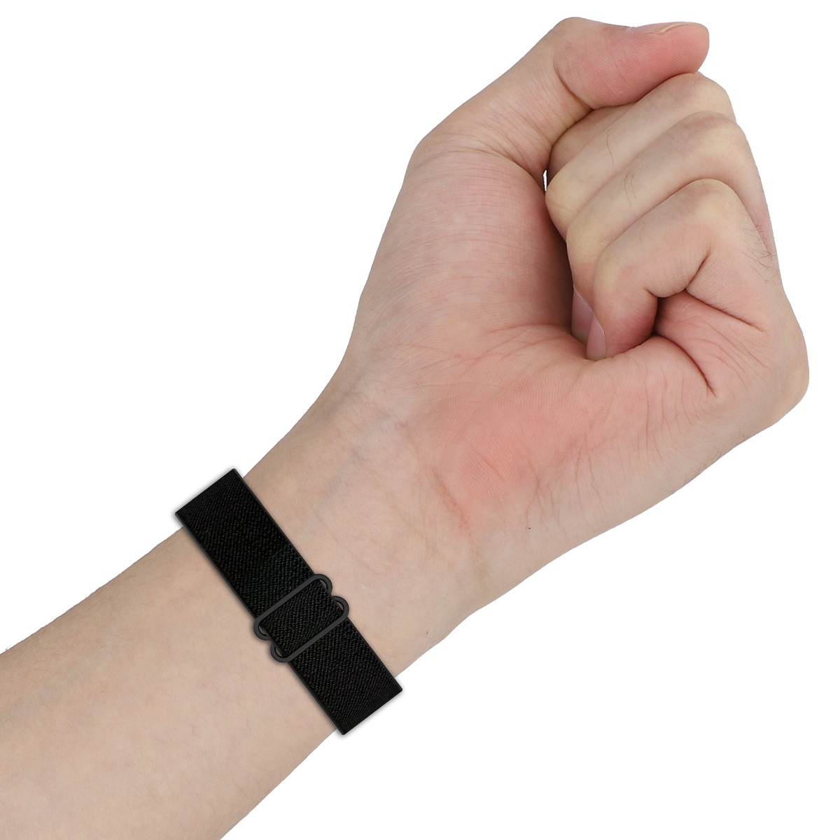 Ein menschlicher Arm mit einem schwarzen Band am Handgelenk, mit einem verstellbaren Verschluss.