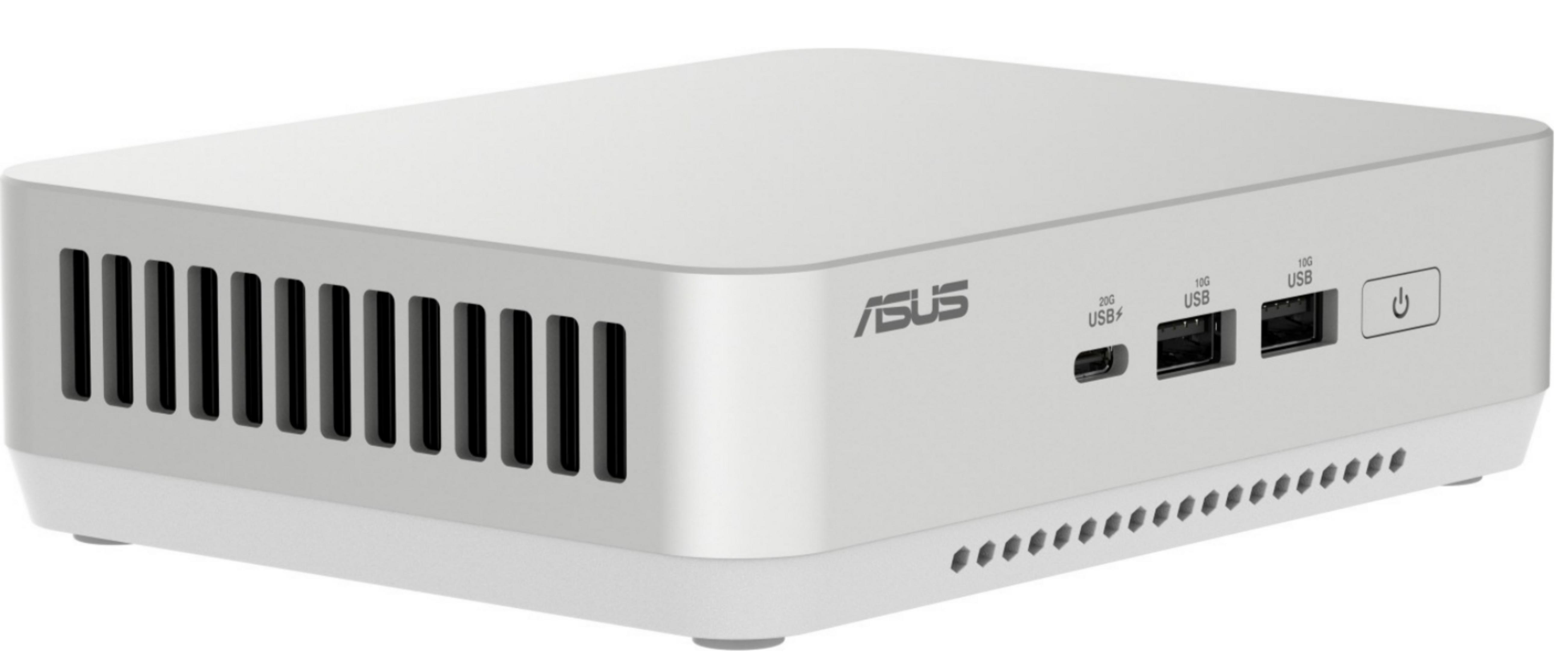 Biały mini PC ASUS z otworami wentylacyjnymi, portami USB i przyciskiem zasilania z przodu.