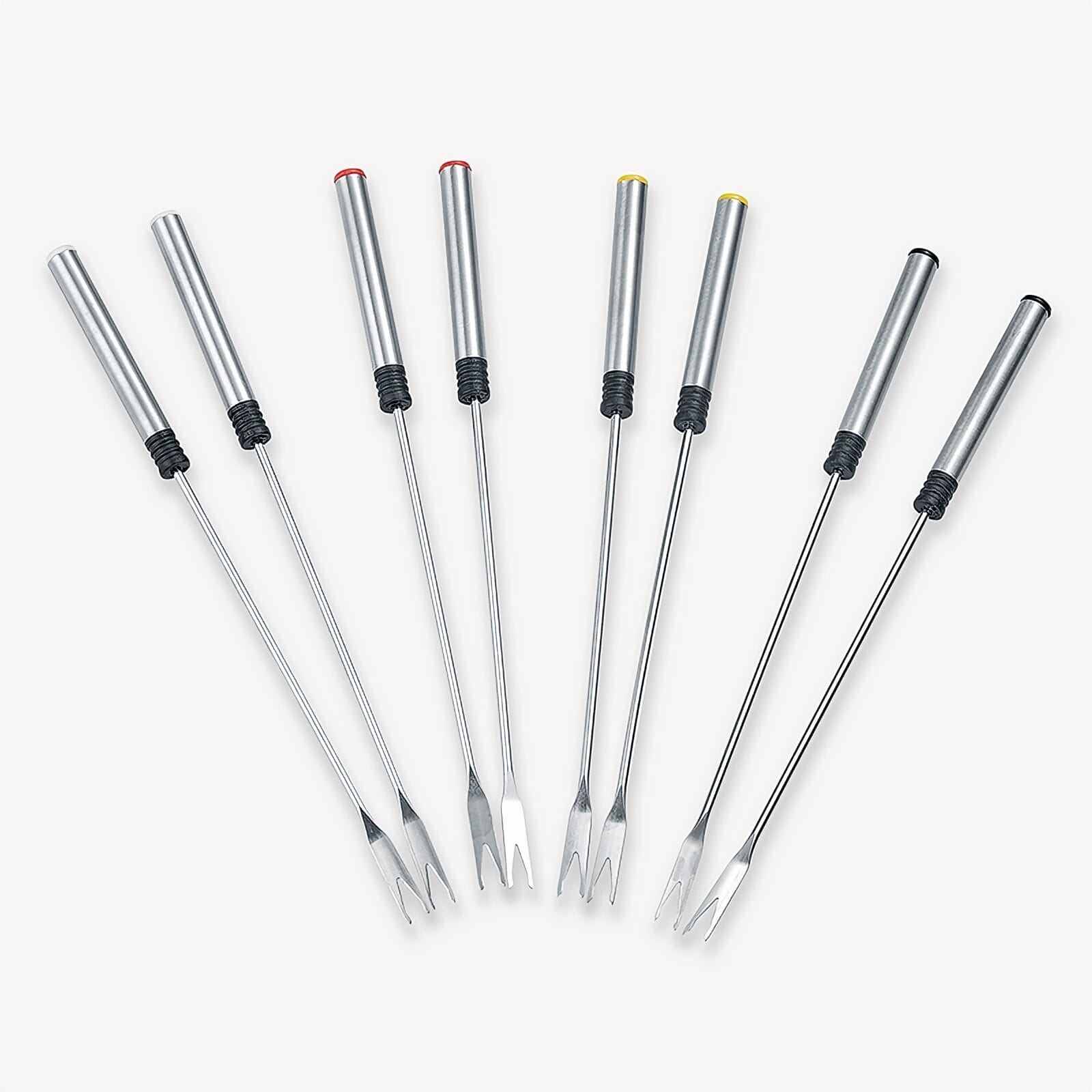 Seven fondue forks with silver handles and colored ends.