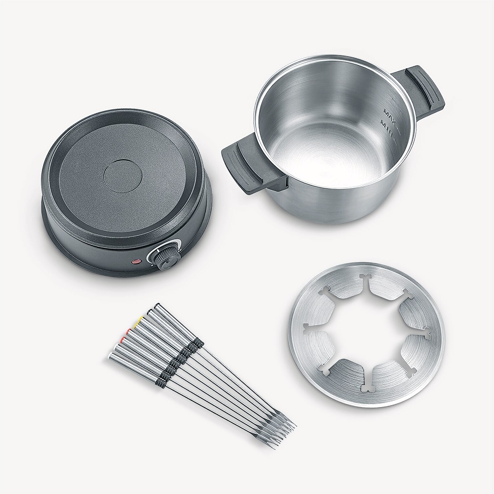 Fondue set: cooker, pot, forks and holder ring on a white background.