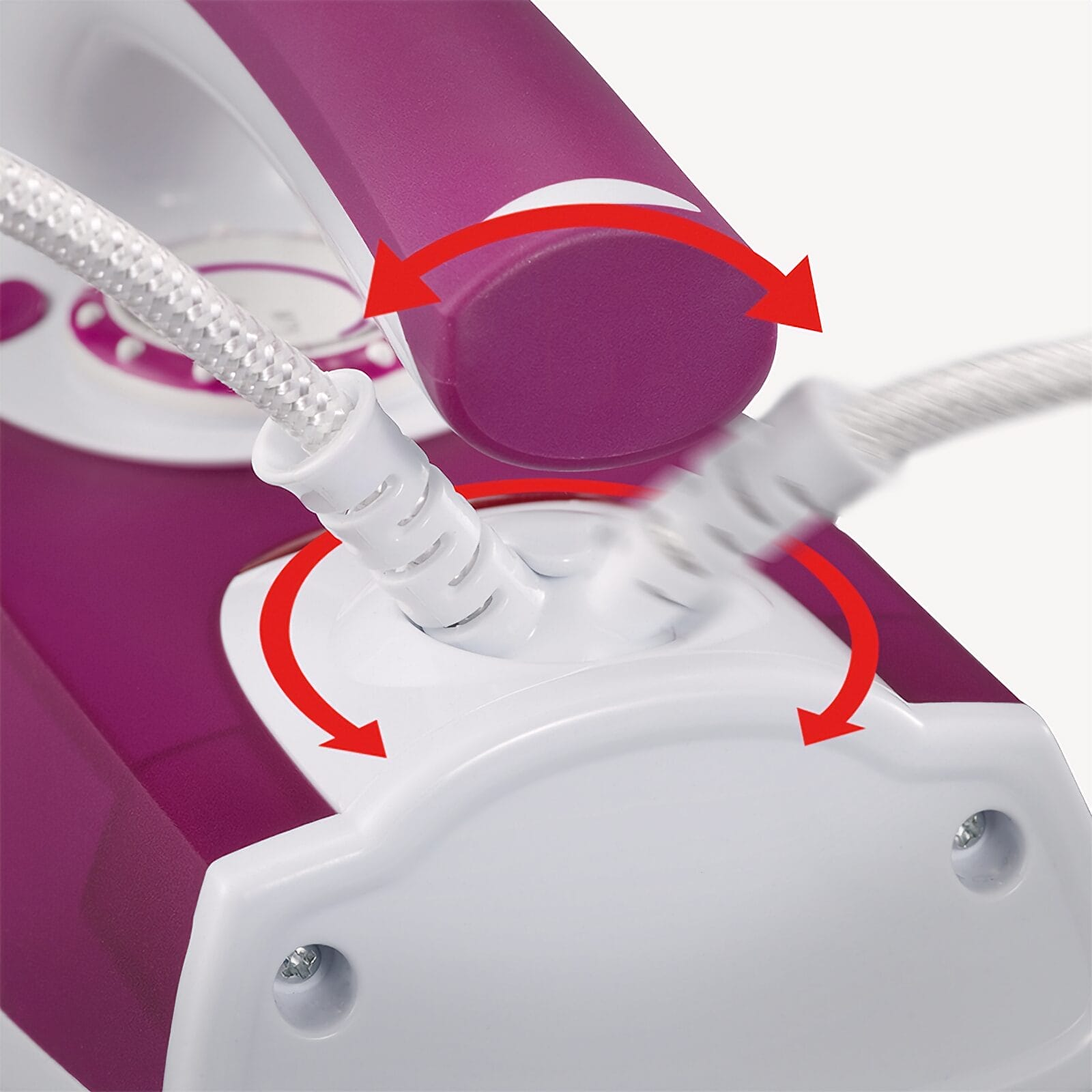 Close-up of an iron with red arrows indicating the cable connection point.