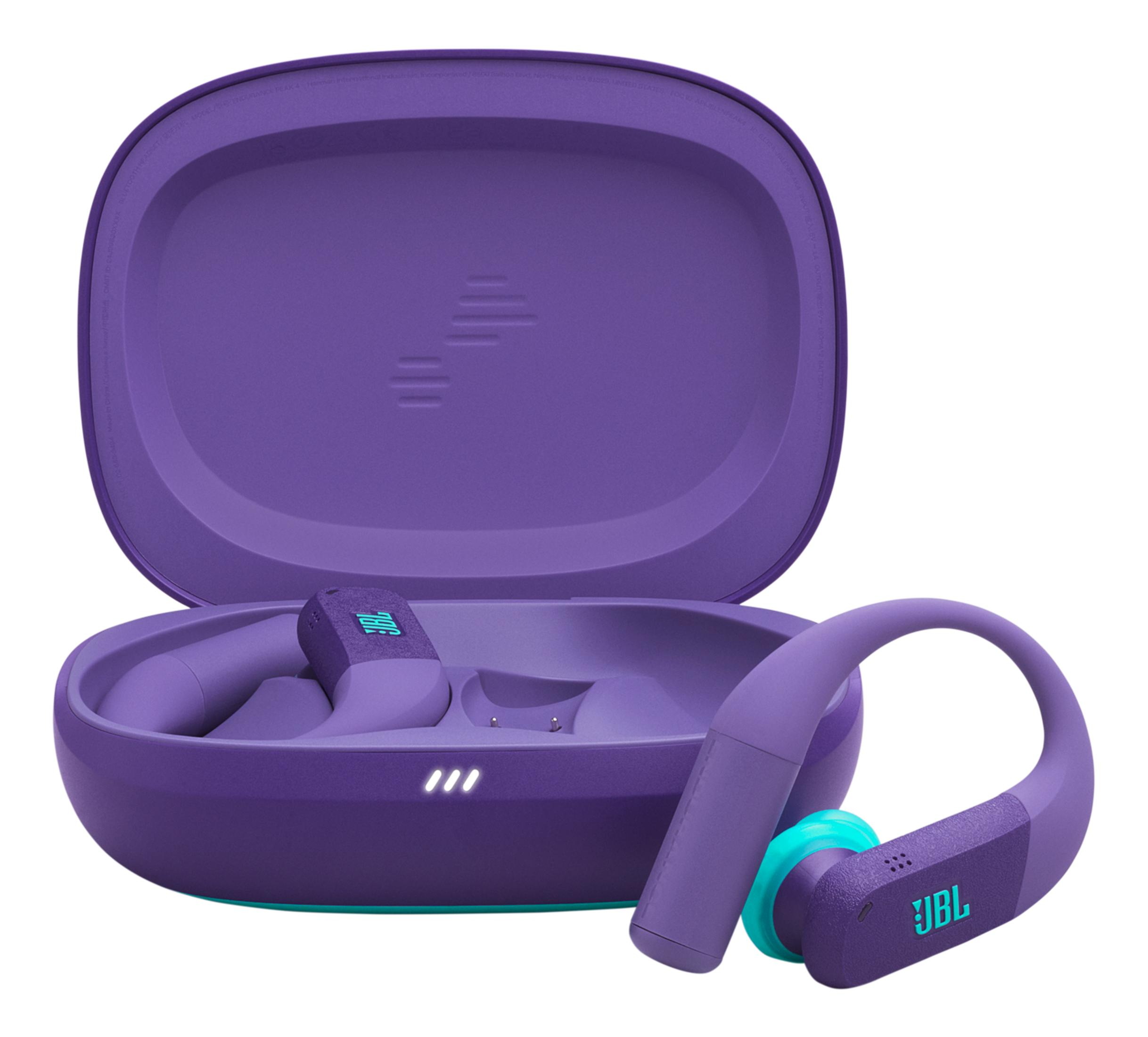 Fioletowe słuchawki JBL i otwarta ładowarka. Jedna słuchawka na zewnątrz.