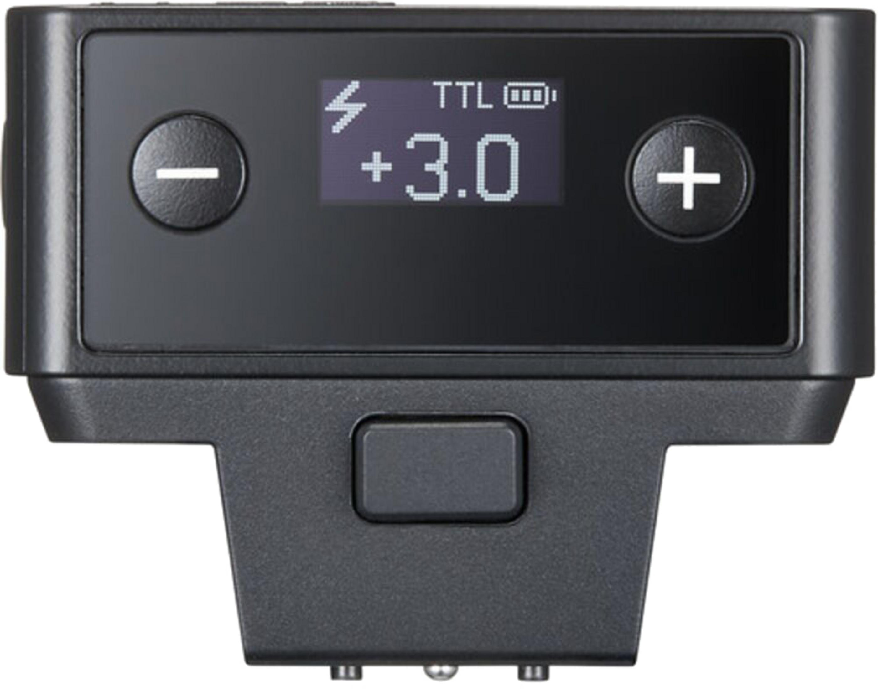 Appareil électronique noir avec écran LCD, boutons et connecteurs.