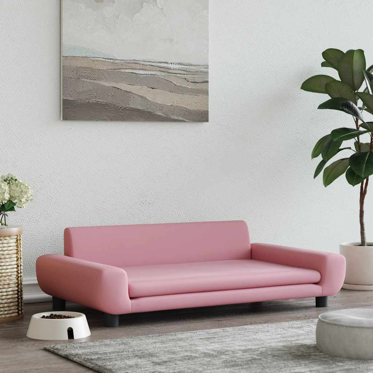 Ein rosa Hundesofa steht vor einem Bild mit Wellen und einem Hundefutternapf.