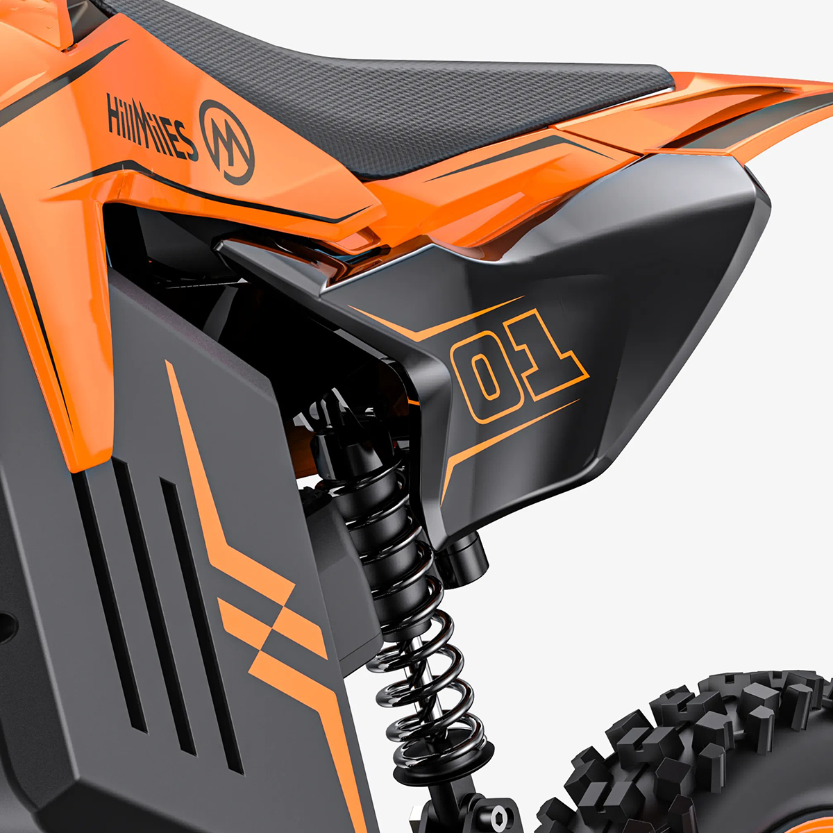 Pomarańczowa rama motocykla z czarnym siedzeniem i amortyzatorem.