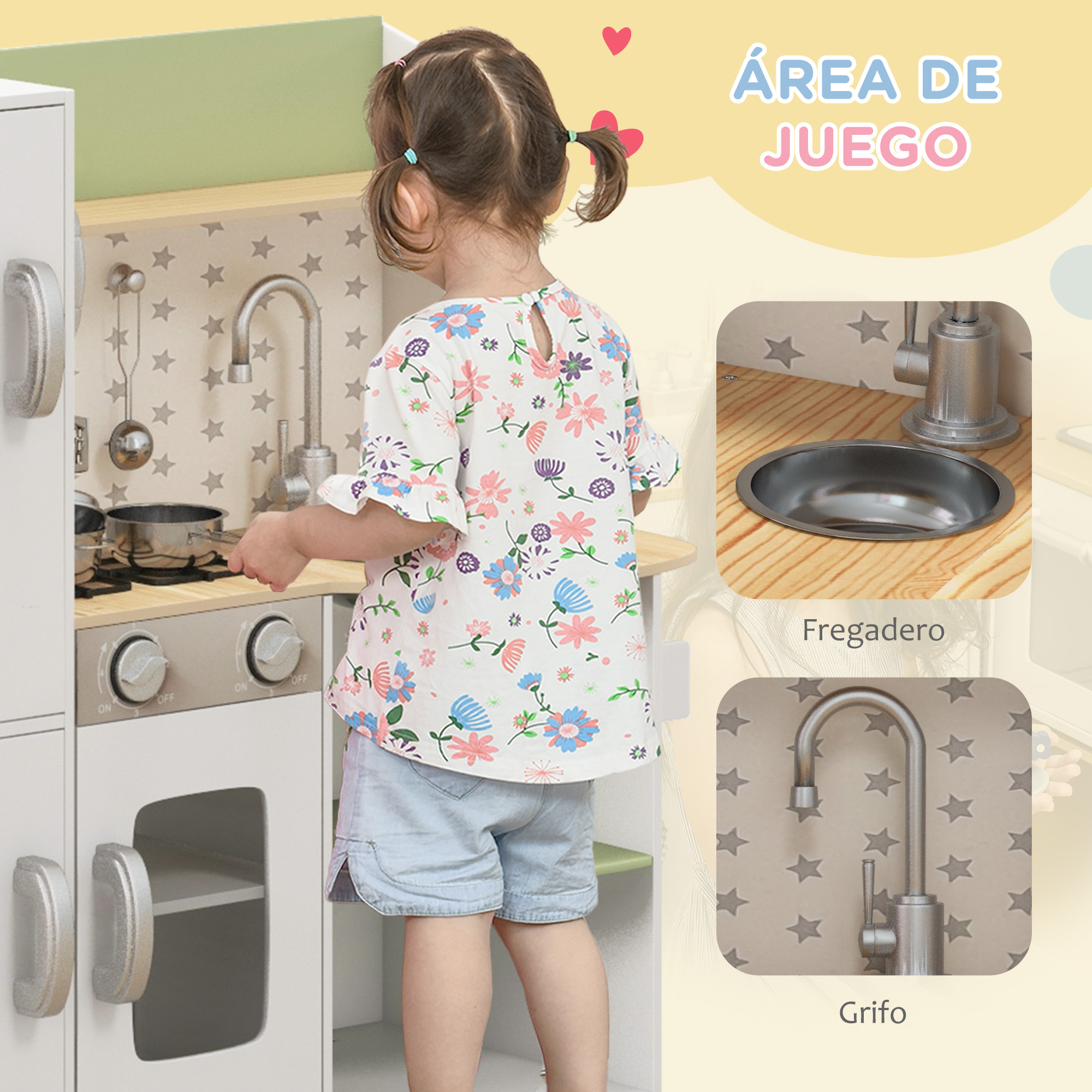 Una niña juega con una cocinita de juguete con fregadero y estufa.