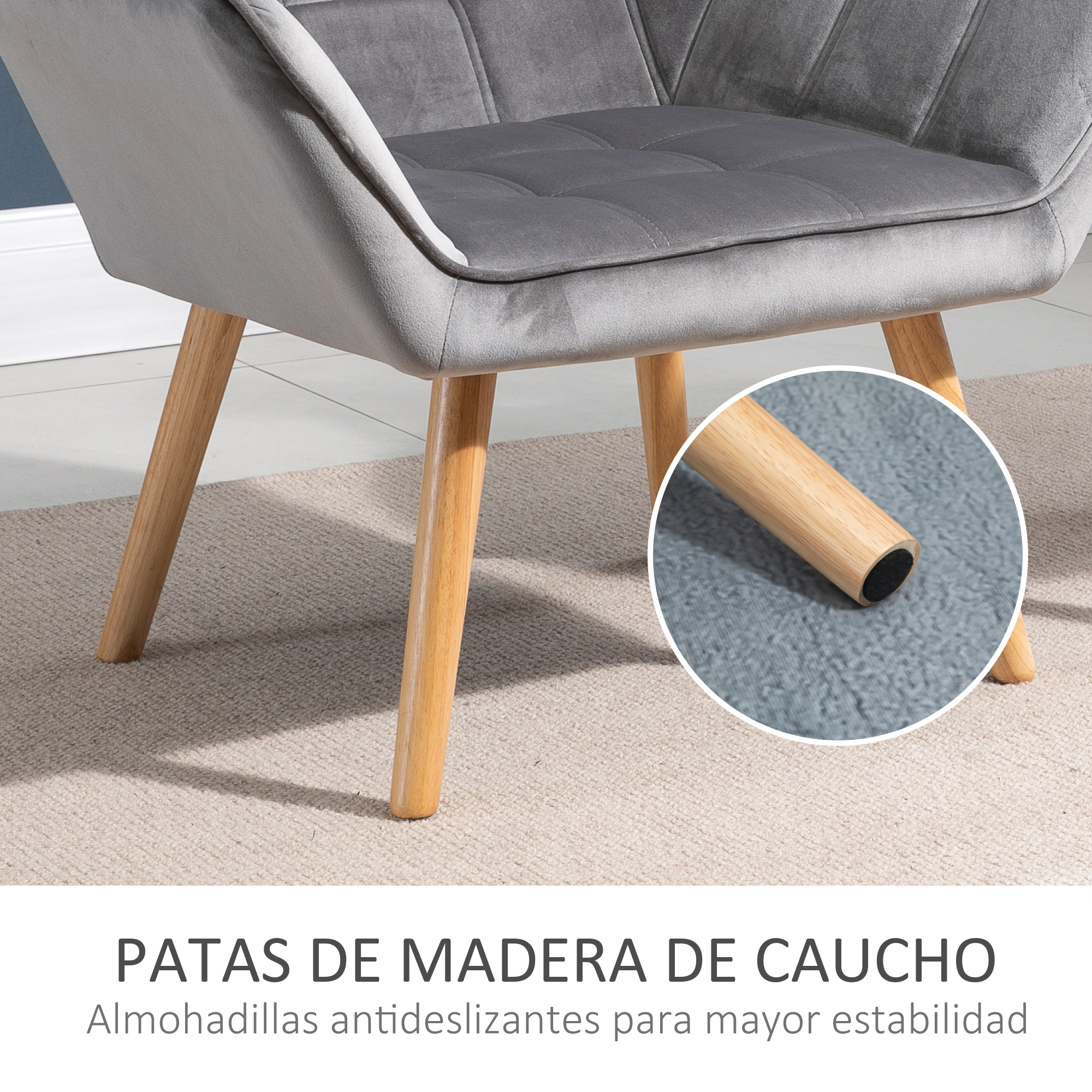 Sillón gris con patas de madera y puntas de goma para estabilidad.