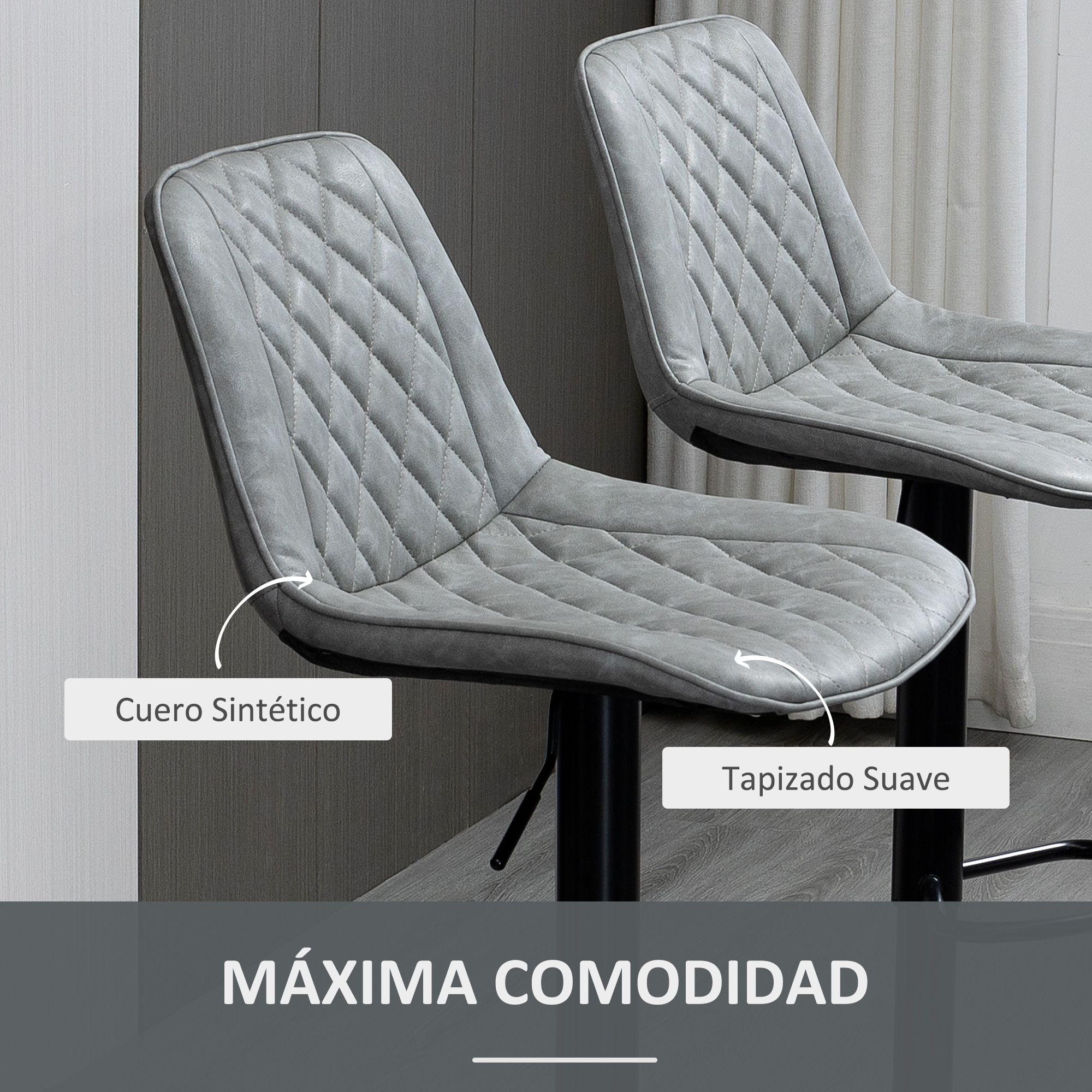 Dos sillas grises de cuero sintético con acolchado de diamantes y tapicería suave.