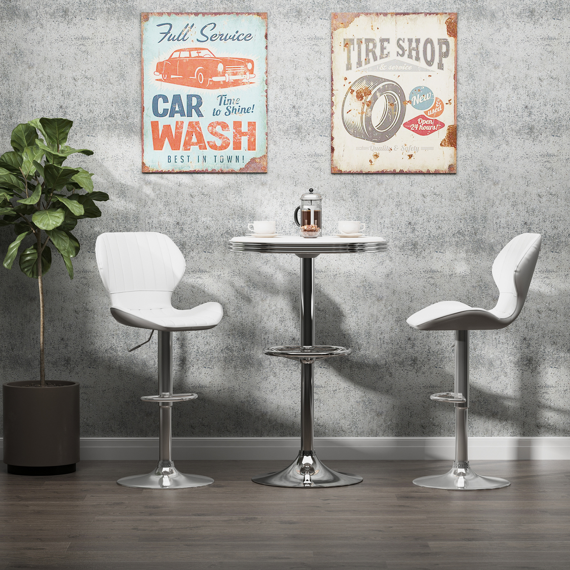 Dos taburetes blancos están junto a una mesa redonda con tazas de café. Decoración mural.