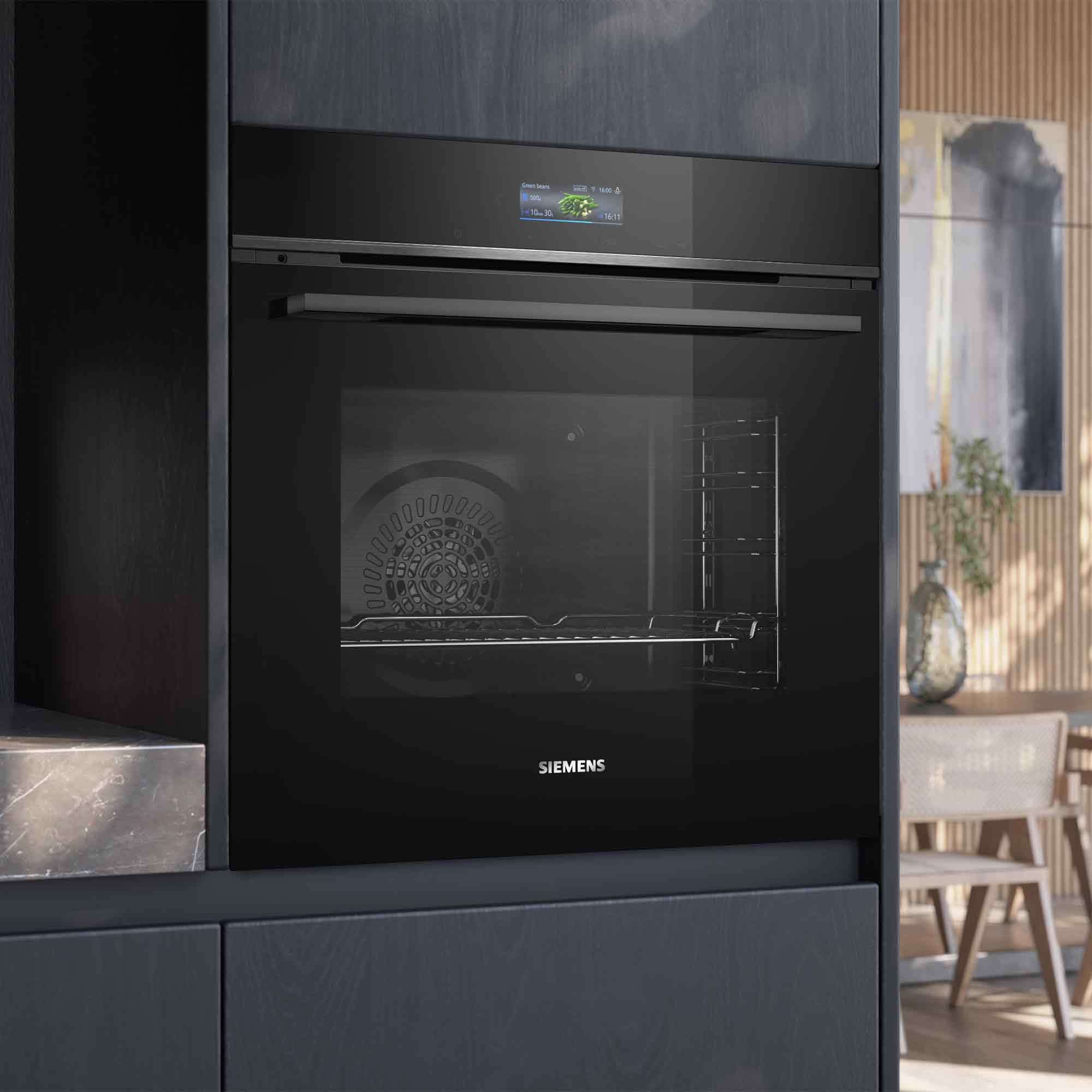 Een moderne, zwarte Siemens oven met digitaal display en glazen deur.