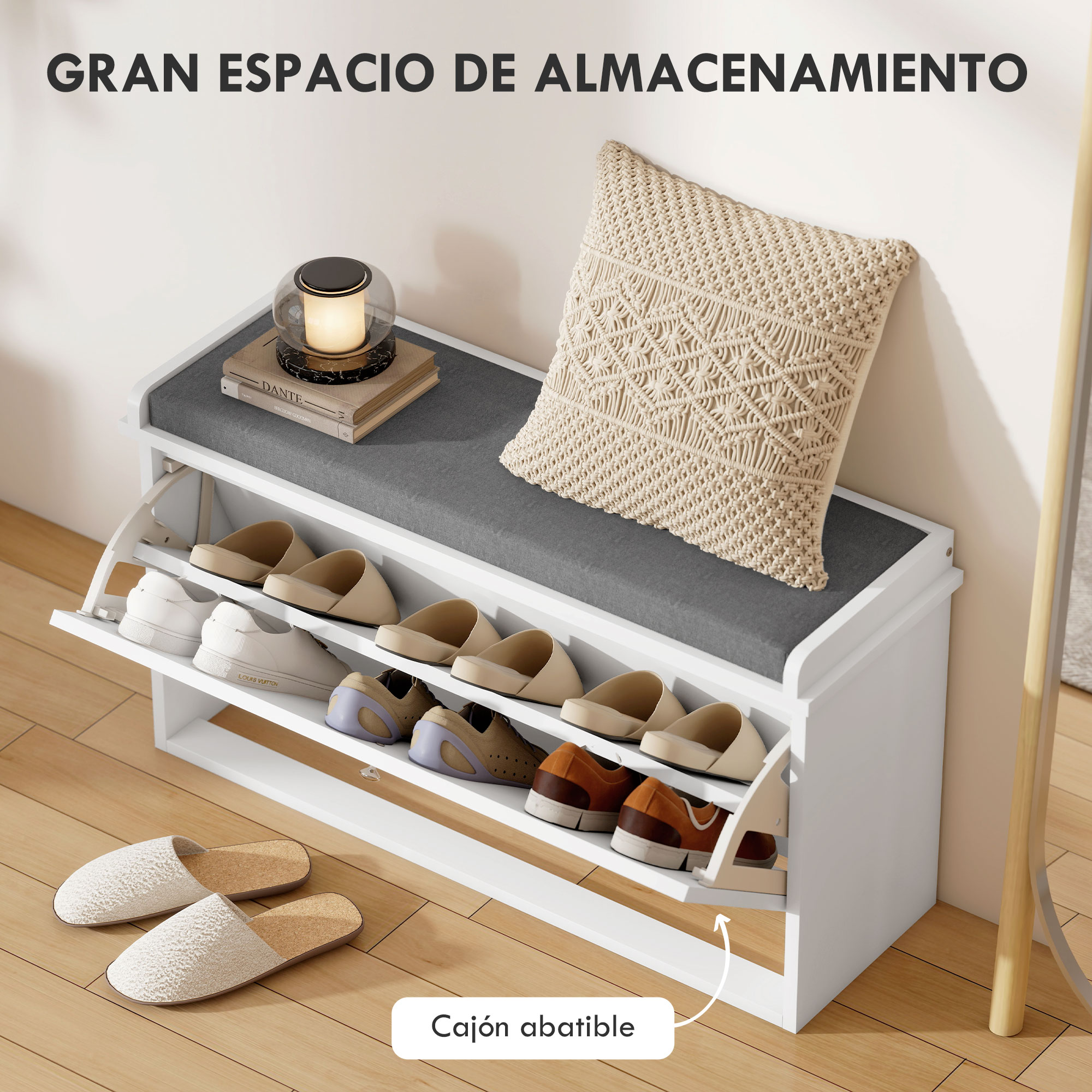 Zapatero blanco con cajones abatibles, asiento tapizado y cojín.