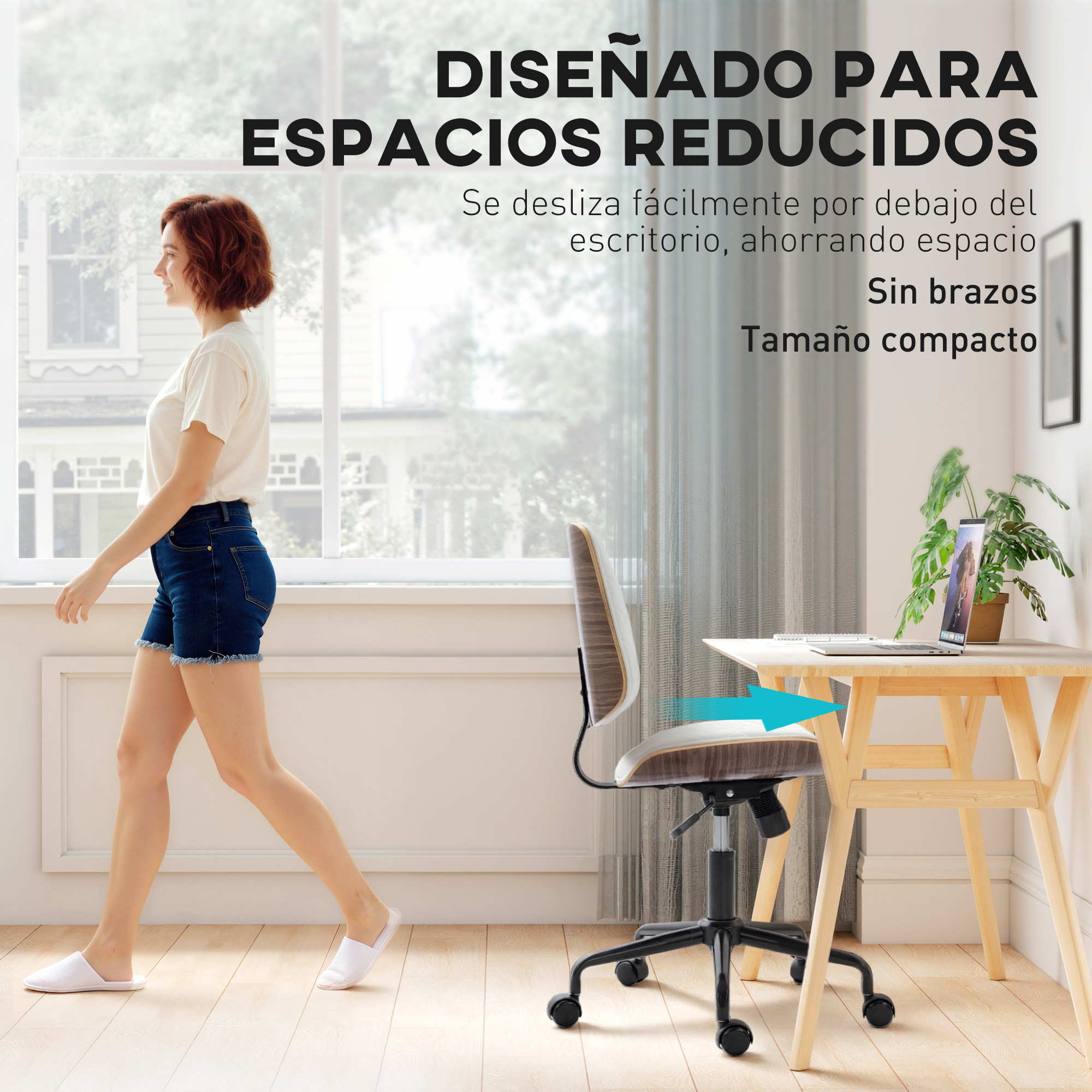 Una mujer pasa junto a un escritorio con un portátil. Diseñado para espacios reducidos.