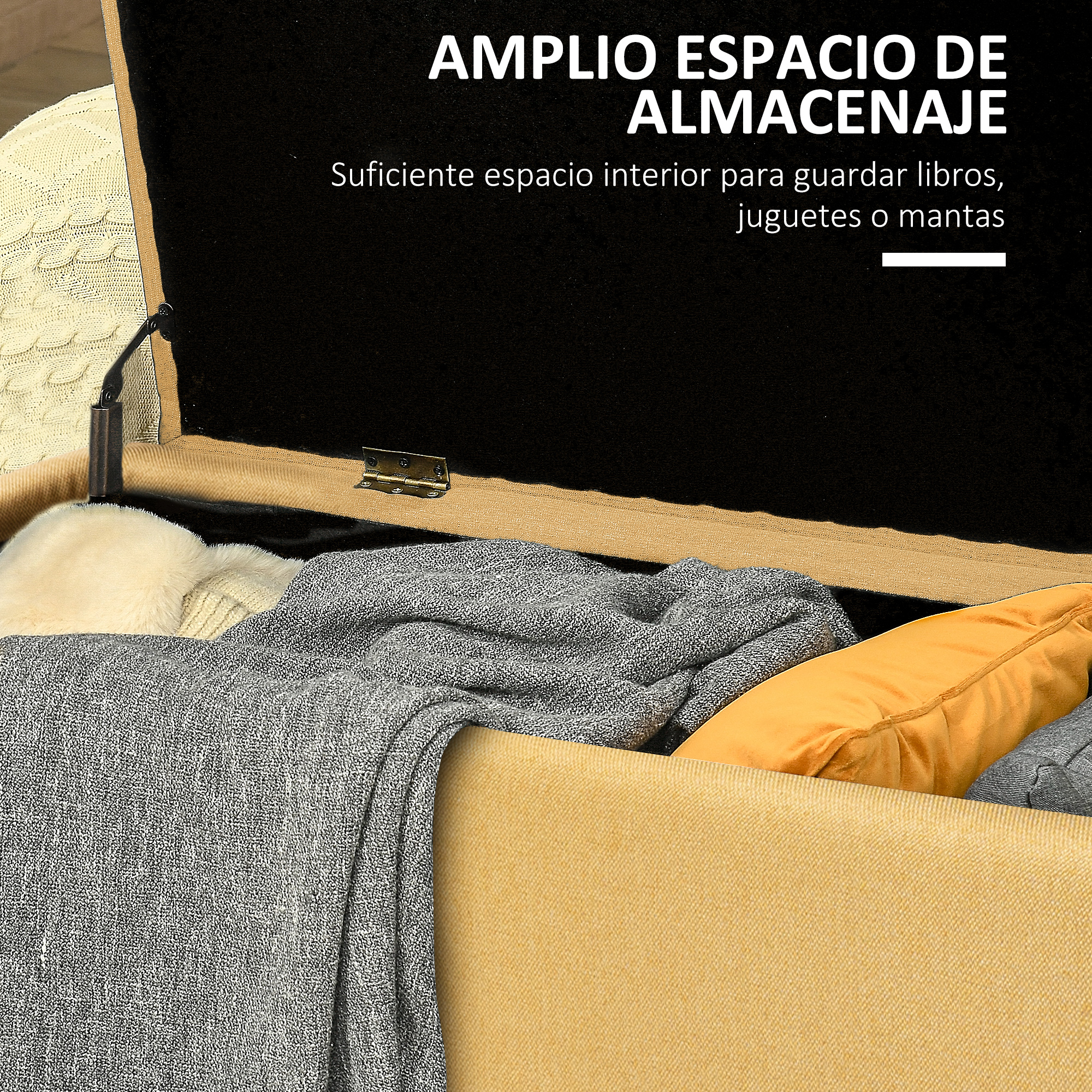 Un otomana de almacenamiento amarillo abierto con mantas y almohadas dentro.