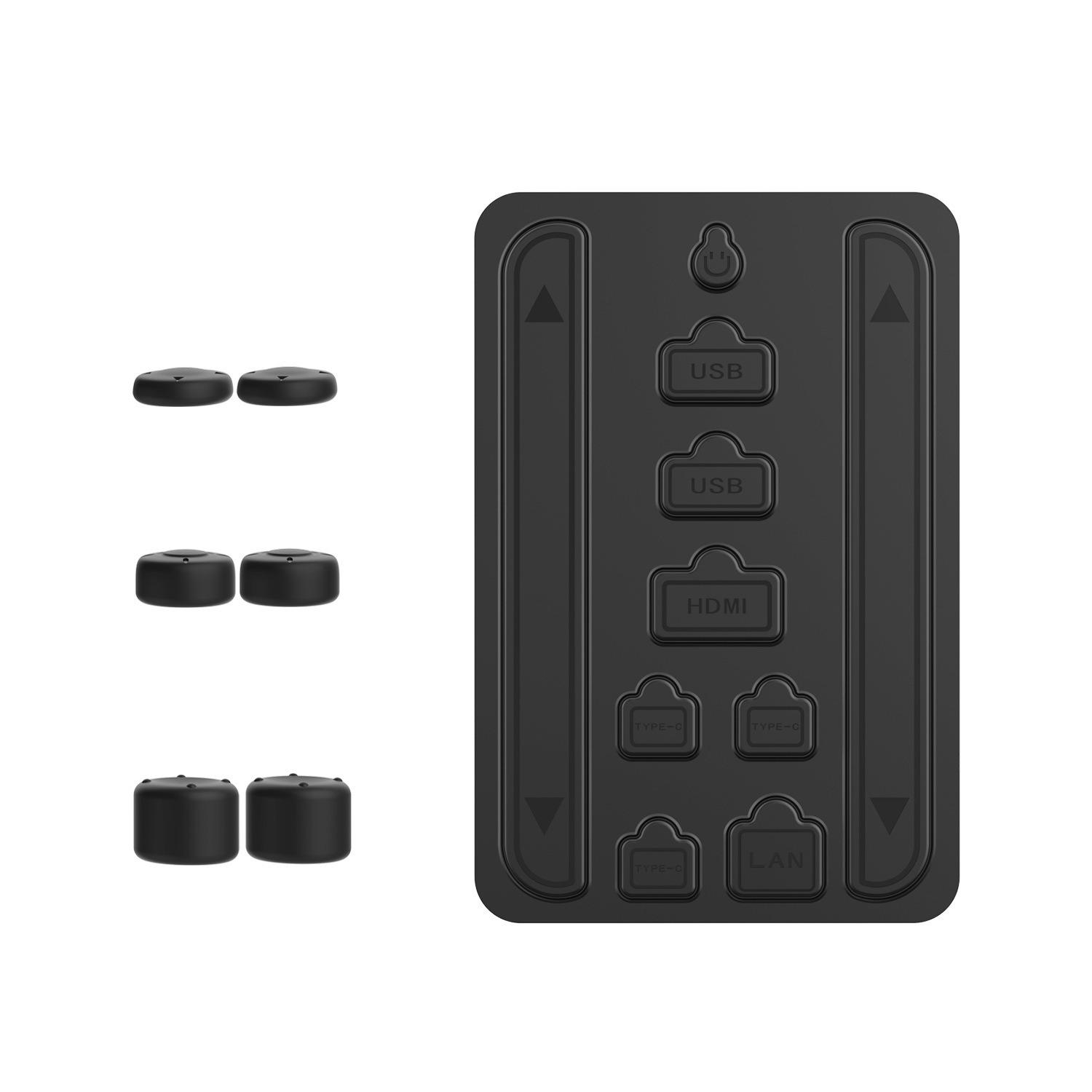 Schwarzer Adapter mit USB-, HDMI-, LAN-Anschlüssen und kleinen Kappen.