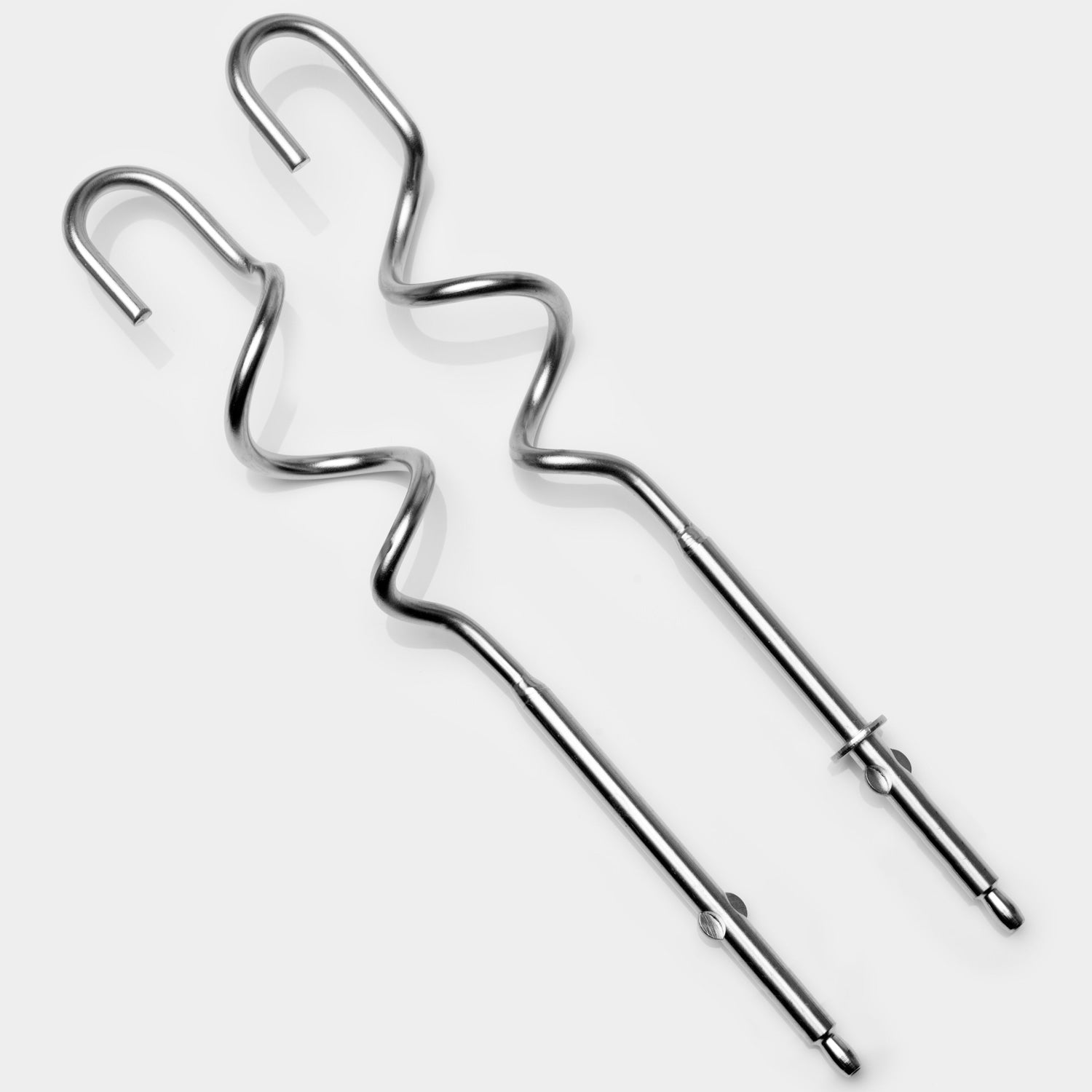Two silver mixer beaters with twisted shafts and hooks on a white background.