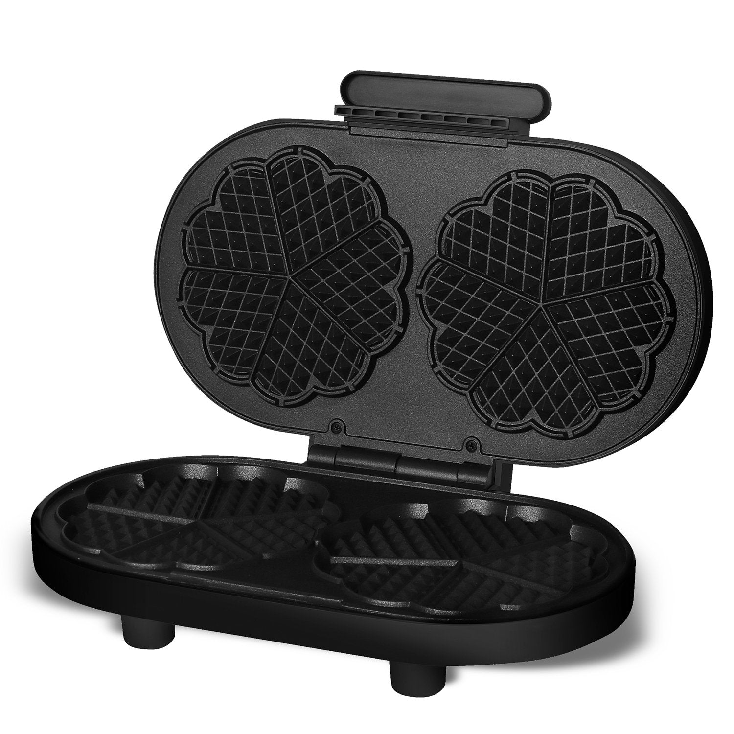 An open, black waffle maker with heart-shaped indentations.