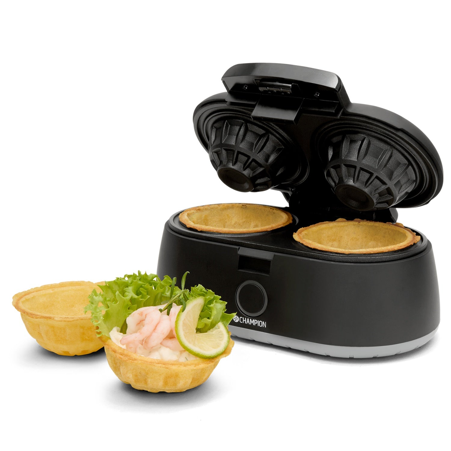 A black appliance with two tart shells, one filled with shrimp, lettuce, and lemon.