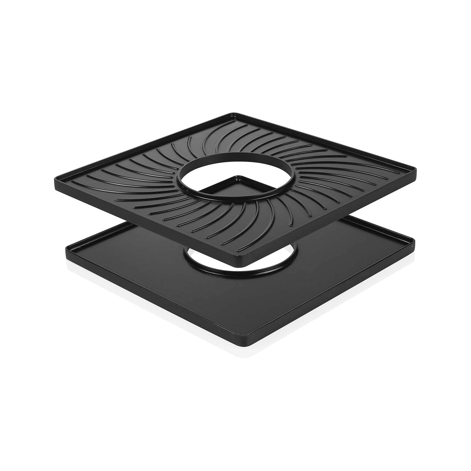 Two black, square grill pans with concentric grooves and a central circle.