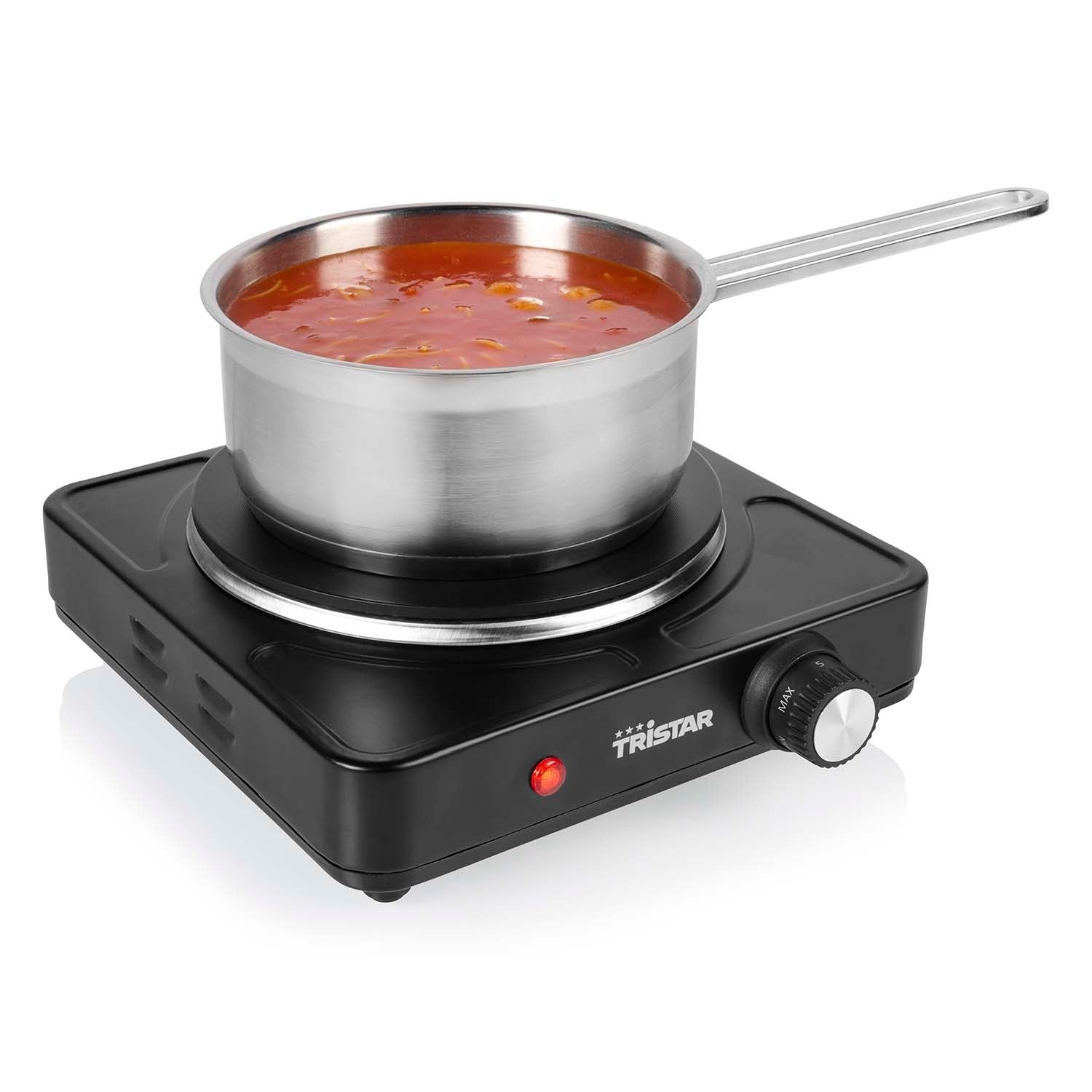 A pot of red sauce on a black electric stove with a red indicator light.