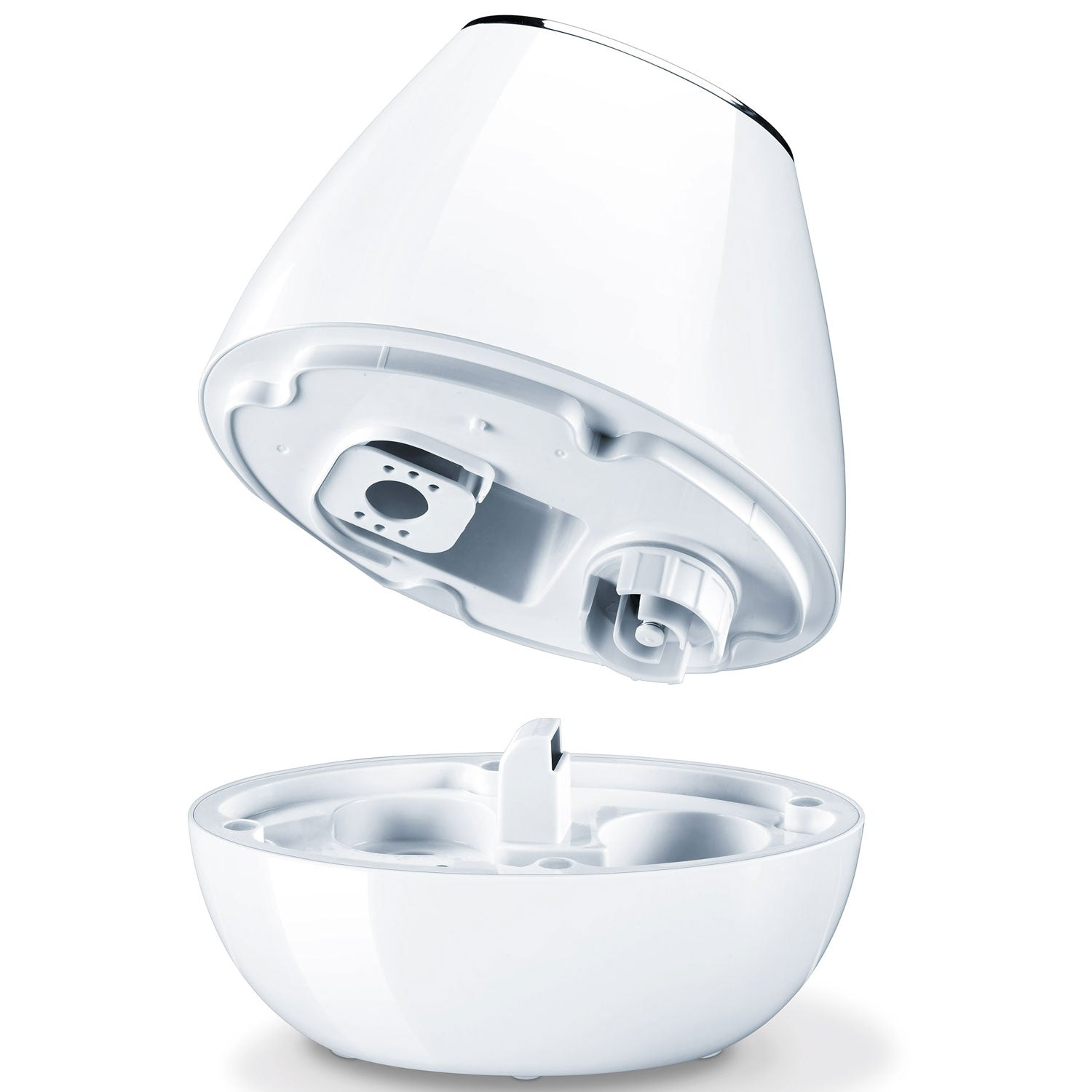 A white humidifier shown in two parts: the base and the top container.