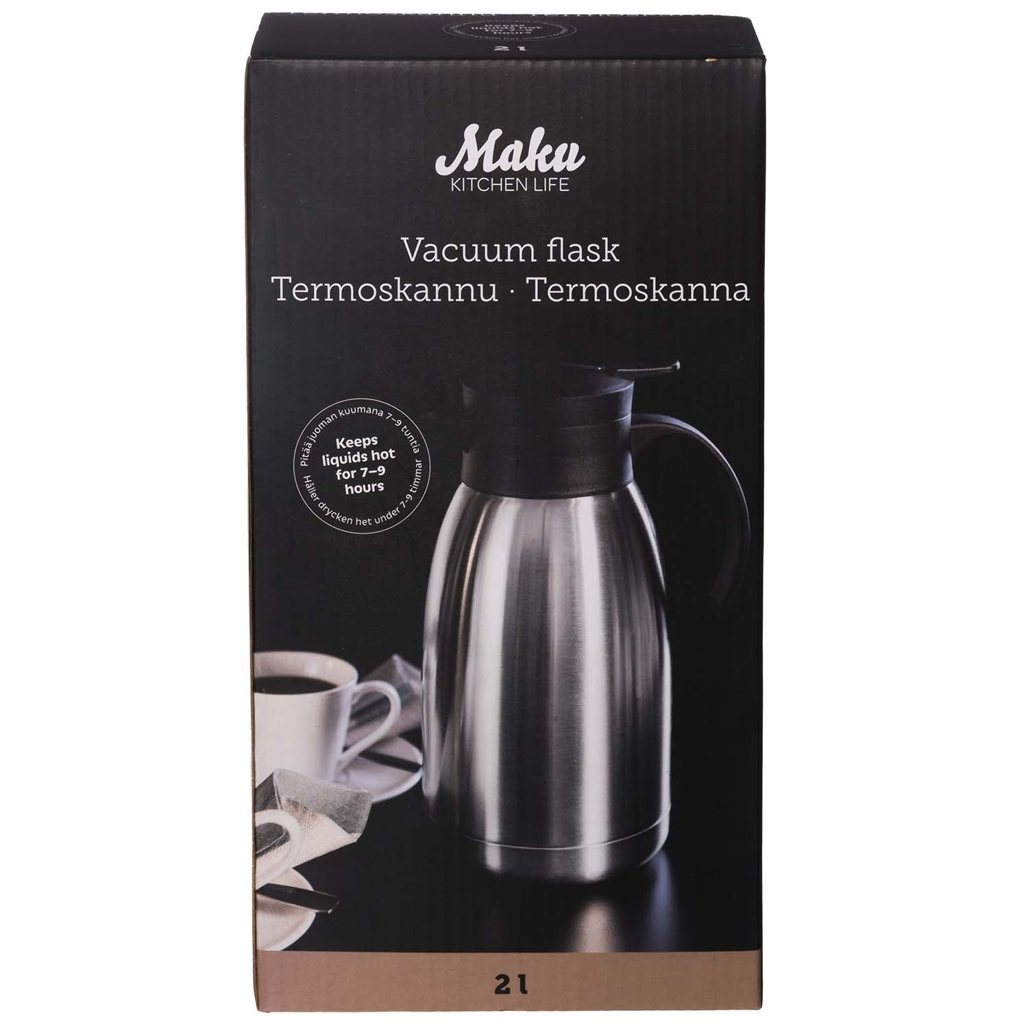 Silver vacuum flask with black lid and a coffee cup nearby.