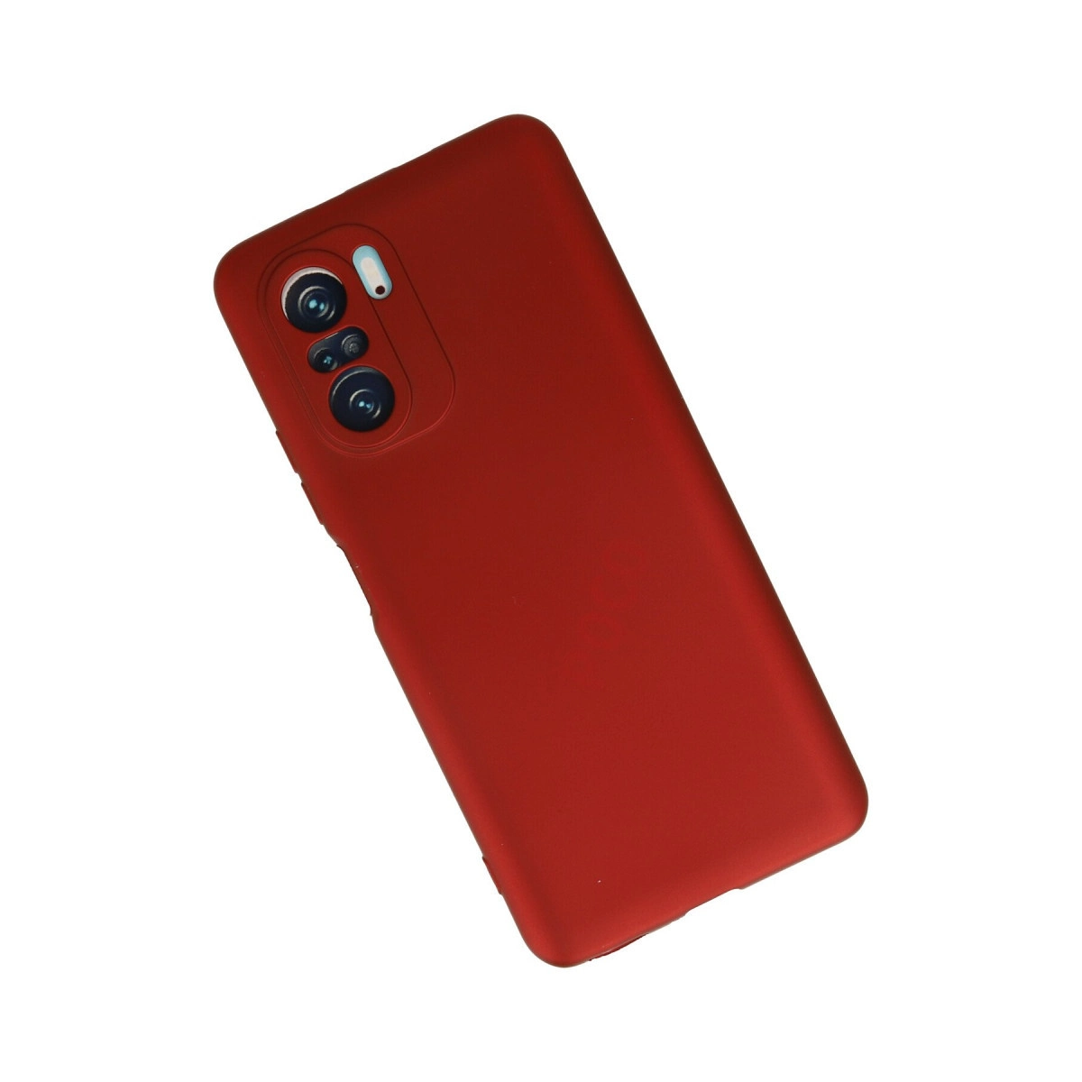 Beyaz arka plan üzerinde kamera lensleri ve flaşlı kırmızı telefon kılıfı.