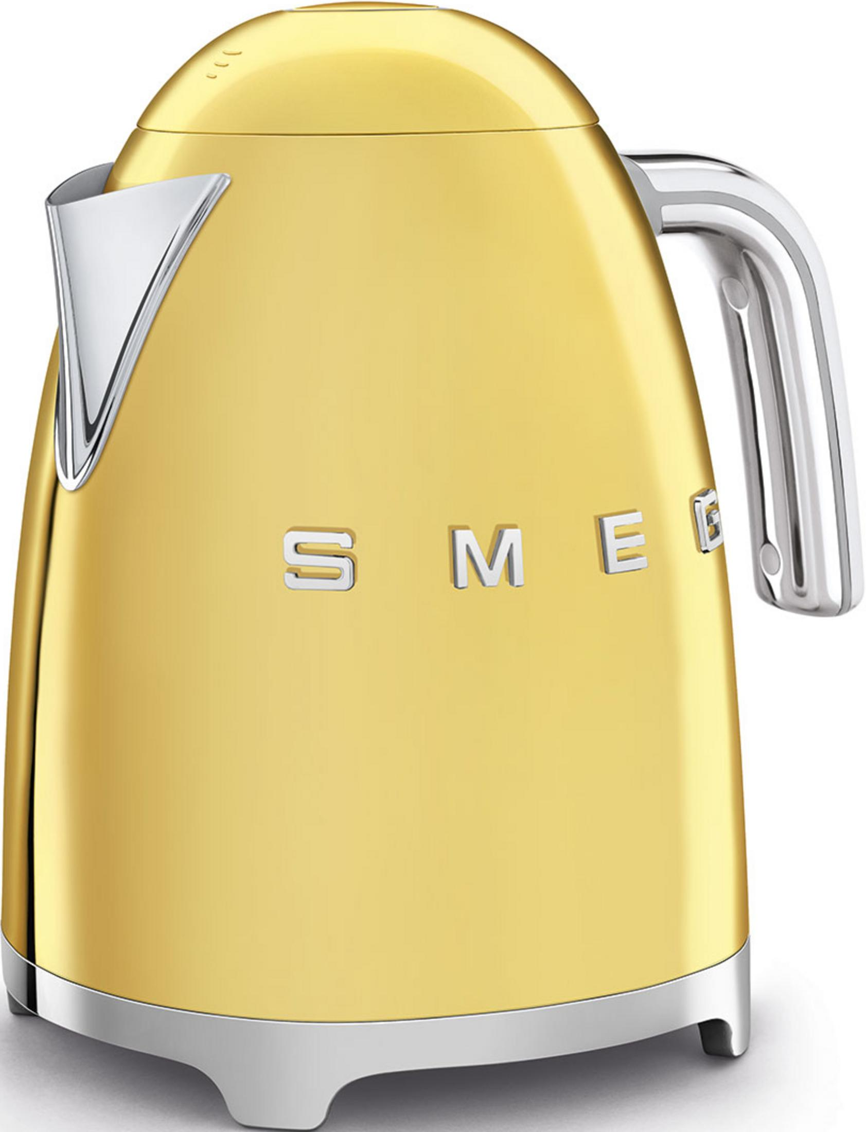 A gold kettle with a silver handle and spout, on a white background.