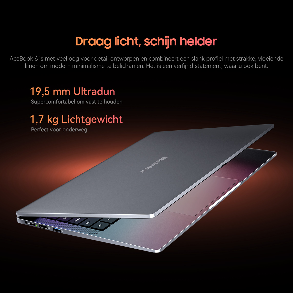A sleek, gray laptop is open, highlighting its thin profile and lightweight design.