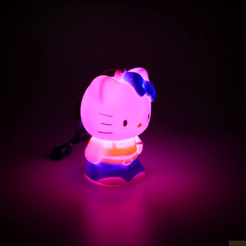 Eine leuchtende Hello Kitty Lampe in Pink und Blau mit einem.&nbsp;Blauen Band.