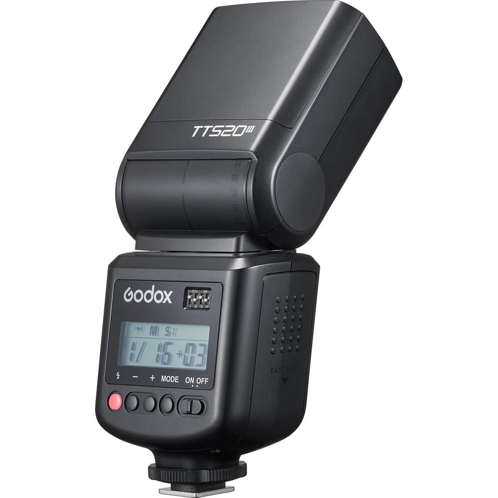 A black Godox TT520II camera flash with a digital display and buttons.