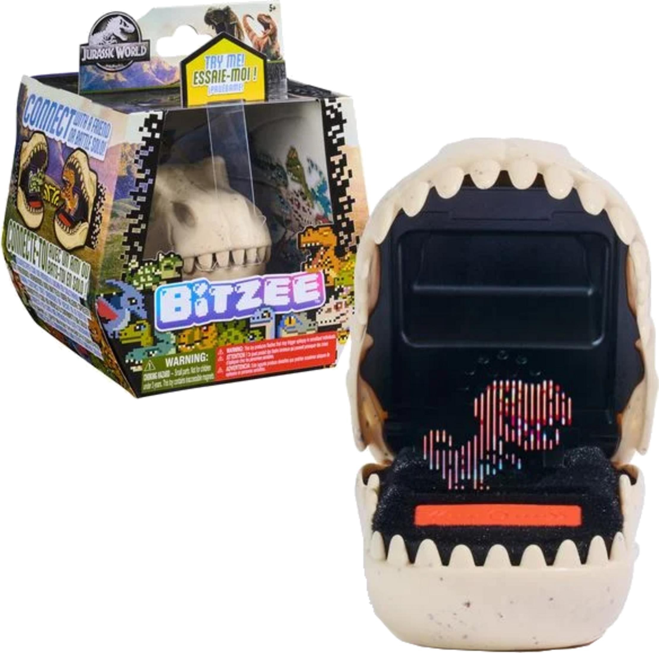 Un juguete Bitzee de Jurassic World con forma de calavera de dinosaurio, abierto, mostrando una pantalla.