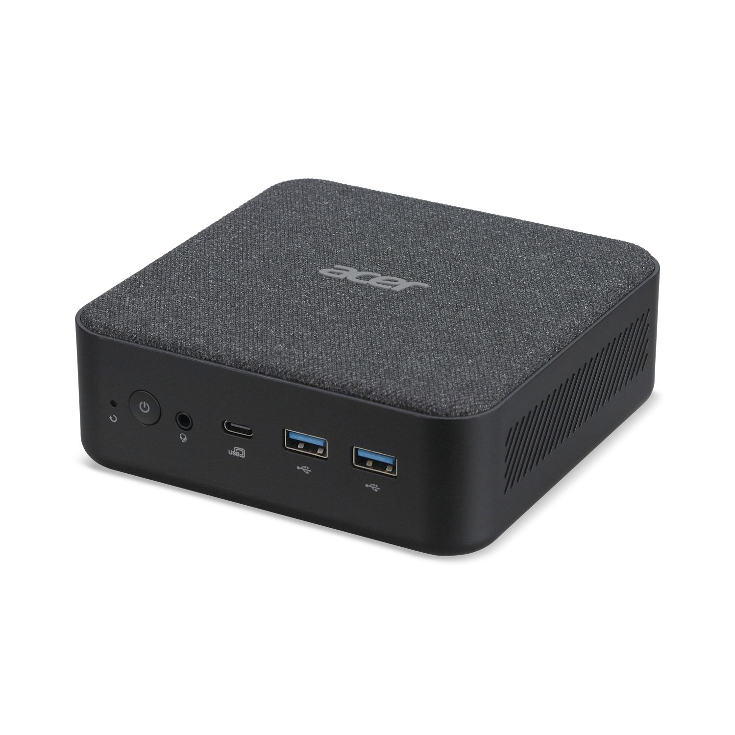 Ein kleiner schwarzer Acer Mini-PC mit Stoffoberseite und USB-Anschlüssen.