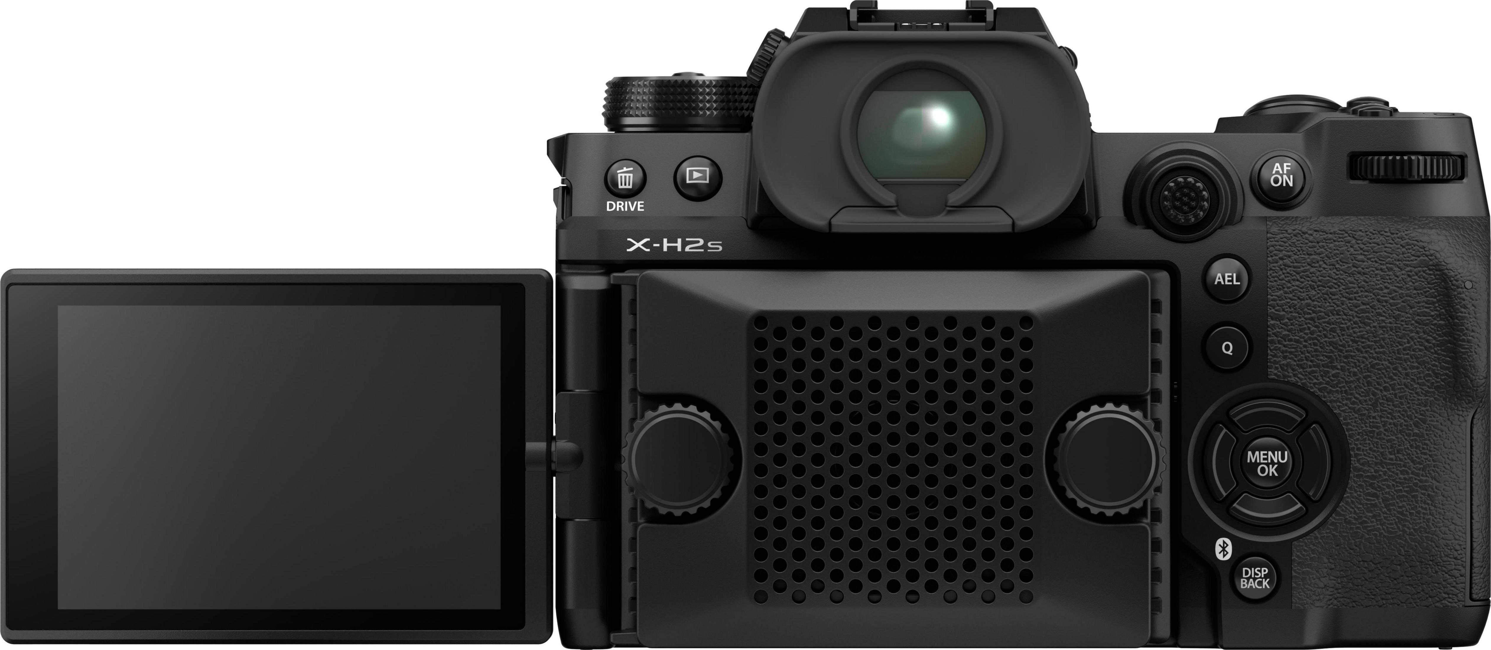 Achterkant van een zwarte digitale camera met uitklapscherm en bedieningselementen.