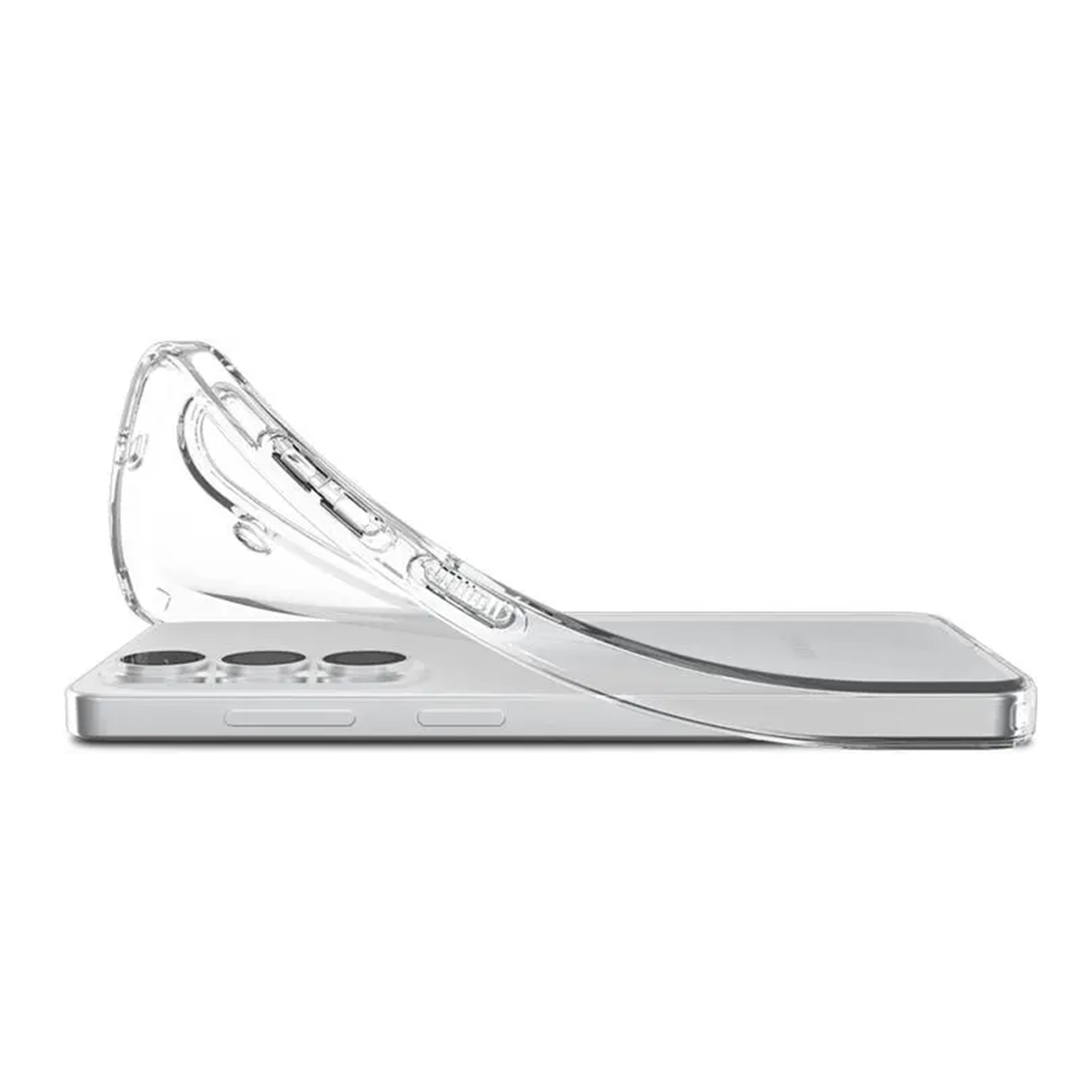 Une coque de téléphone transparente repose sur un téléphone argenté.