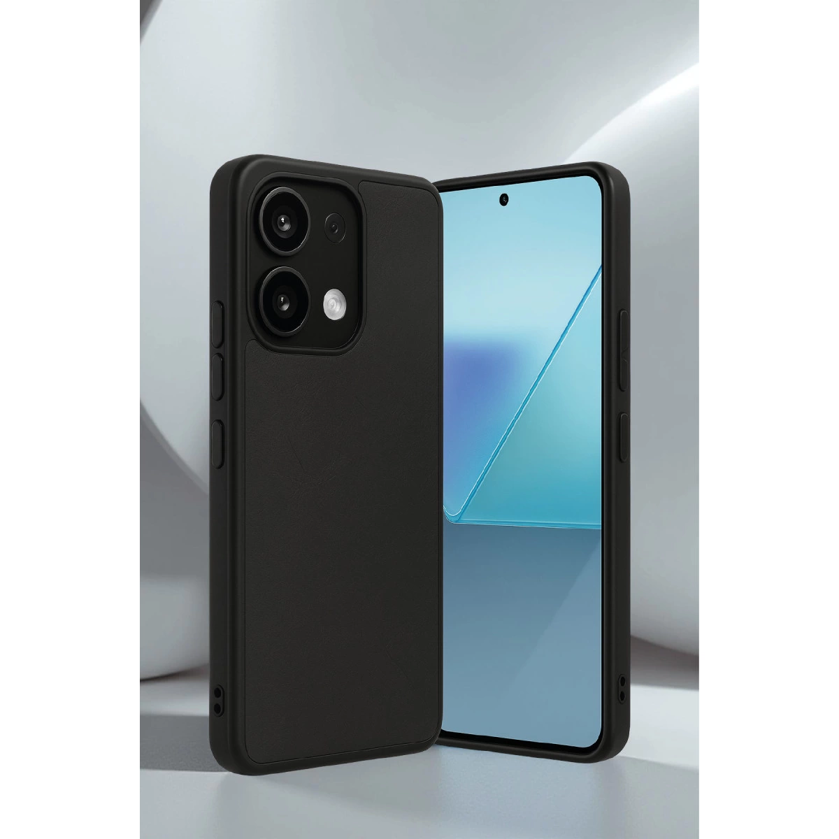 İki kameralı siyah telefon, yanında mavi ekranlı başka bir telefon.