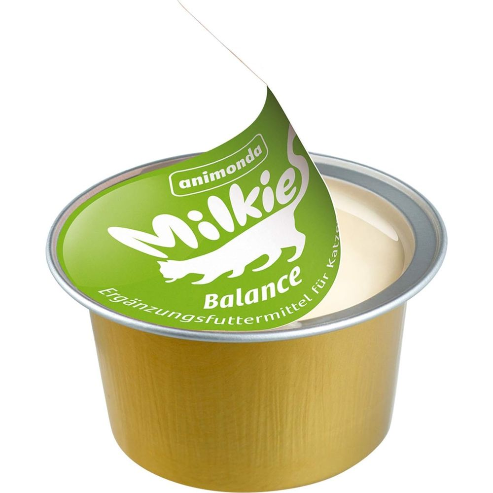 Goldene Dose mit Katzenfutter, Deckel teilweise geöffnet, weiße Katze auf grünem Etikett.